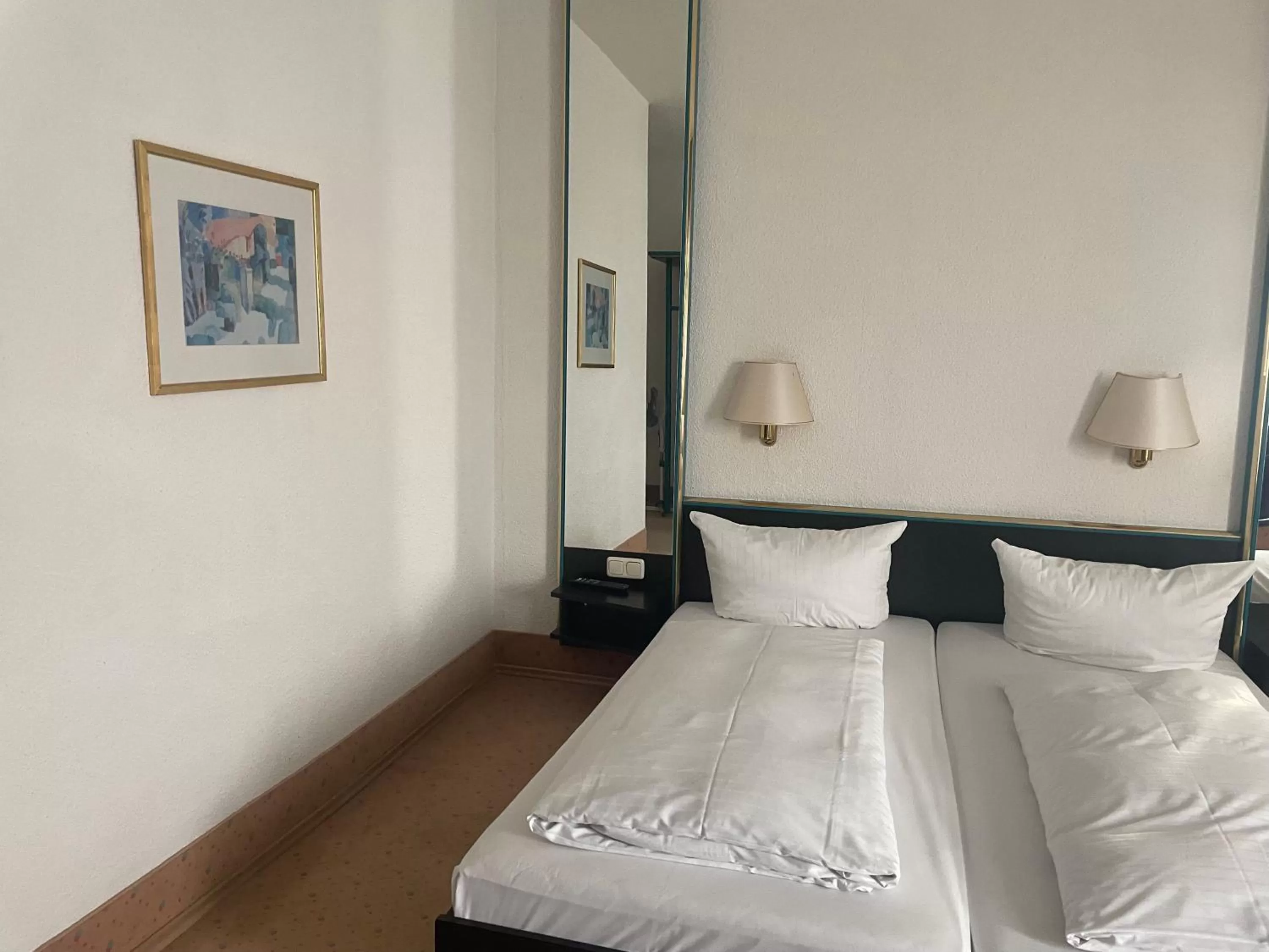 Bed in Hotel Bitterfelder Hof