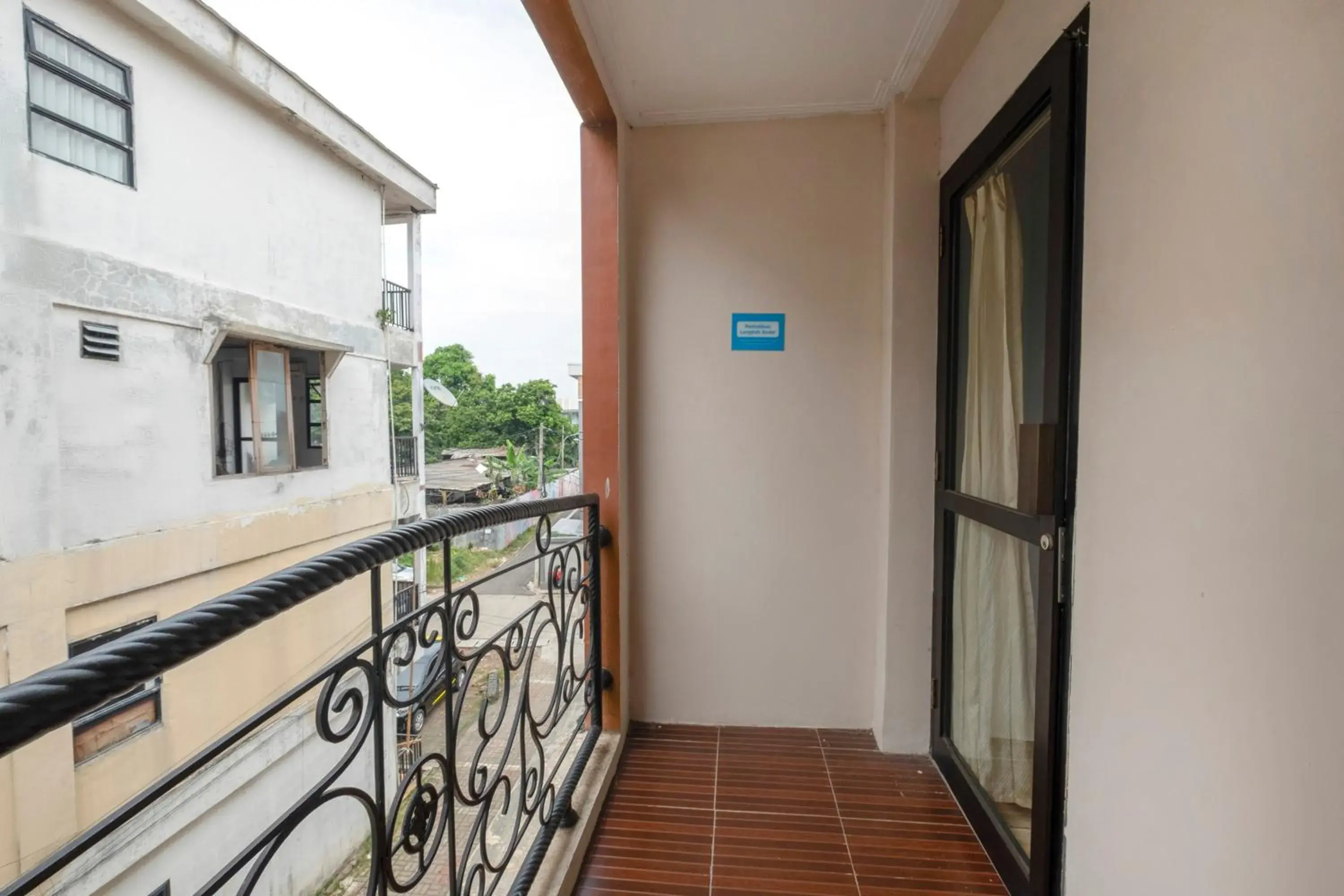 Bedroom, Balcony/Terrace in Super OYO 3747 Comfort Residence