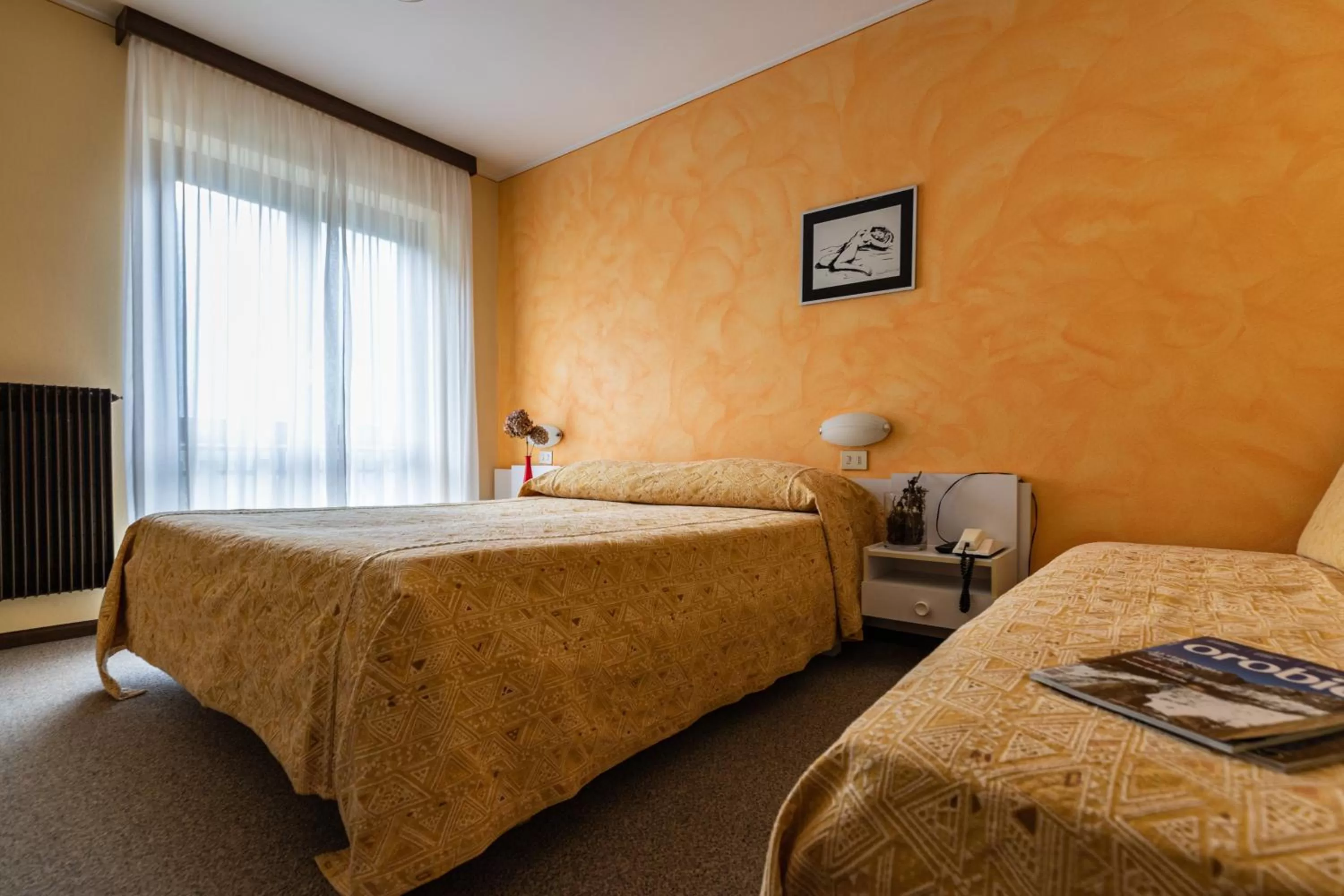 Bed in Meublè La Betulla