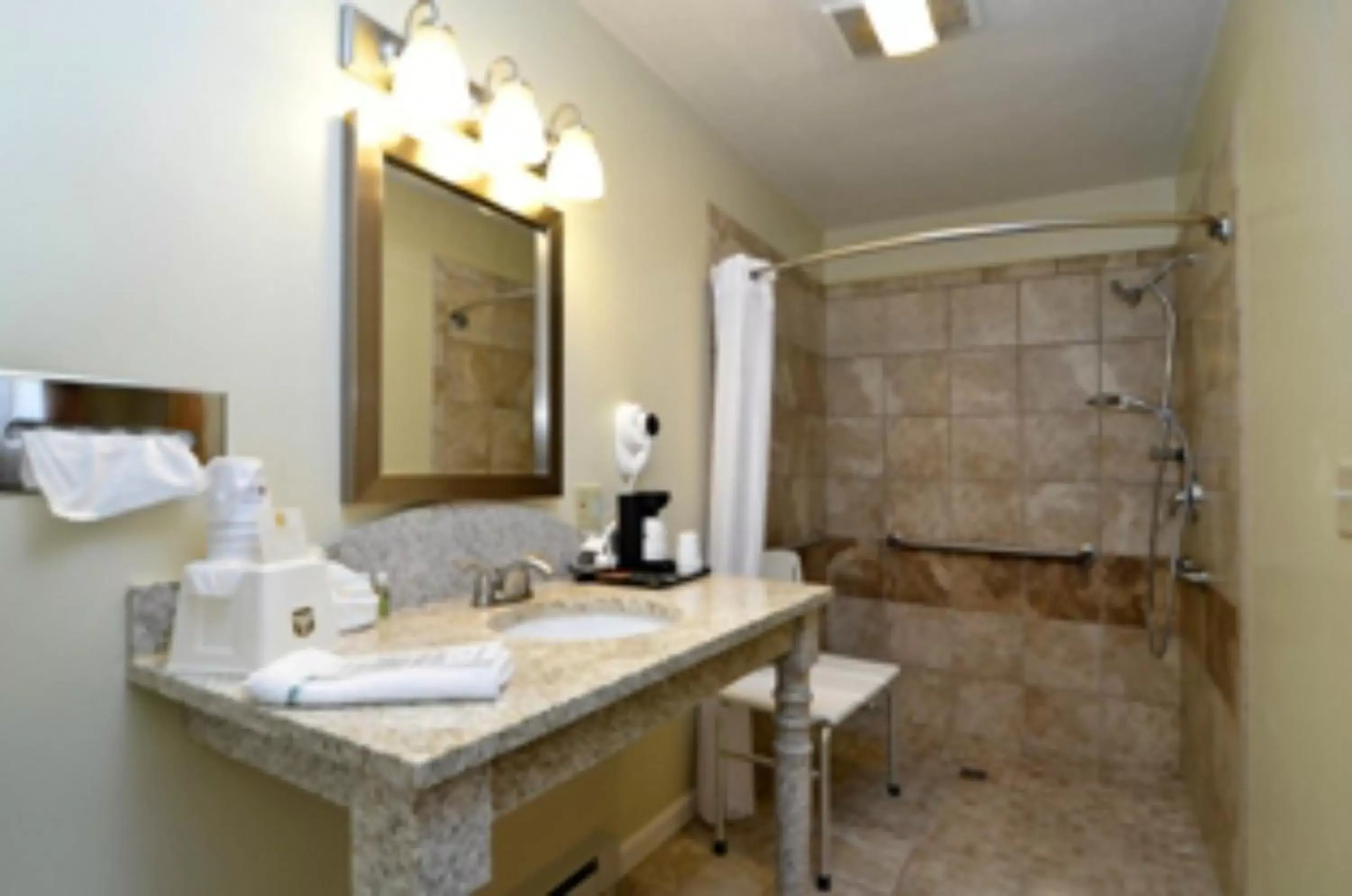 Bathroom in SureStay Hotel by Best Western Cameron