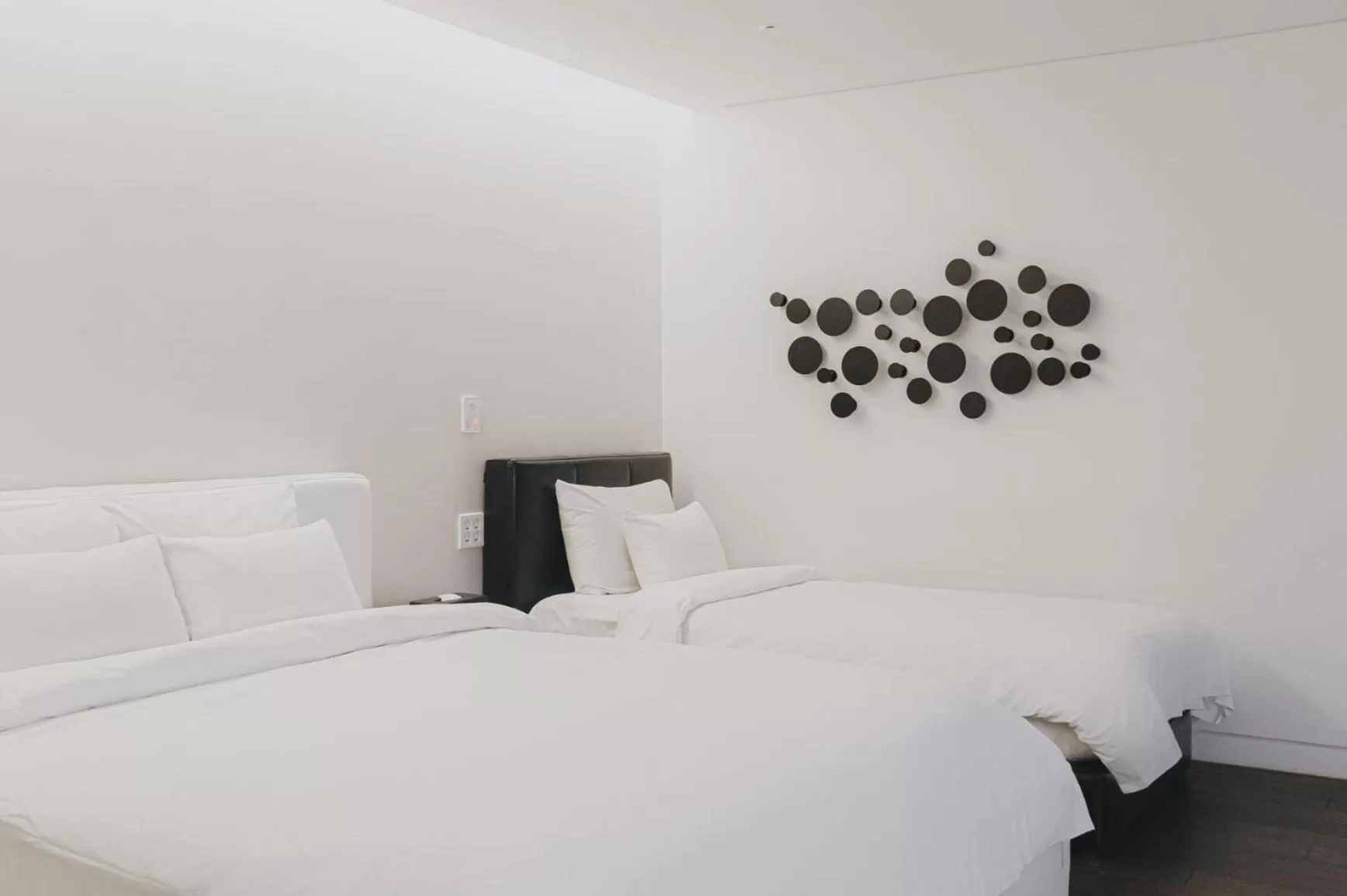 Bed in ACC Design Hotel