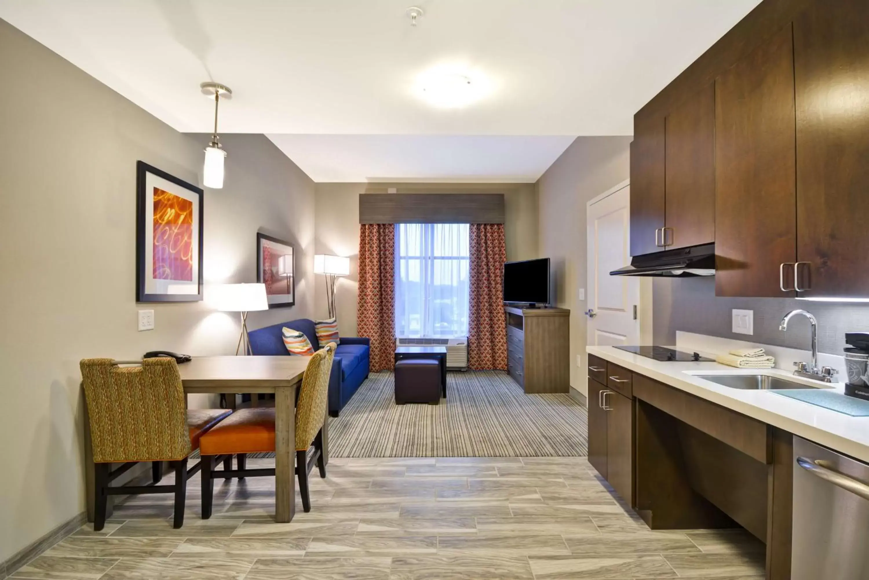 Living room, Kitchen/Kitchenette in Homewood Suites By Hilton Rocky Mount
