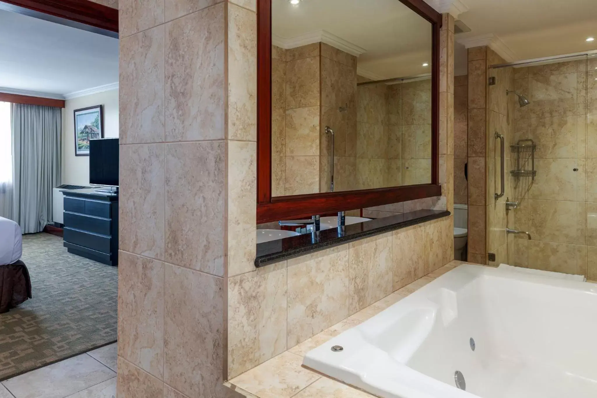 Bedroom, Bathroom in Crowne Plaza San Jose La Sabana, an IHG Hotel
