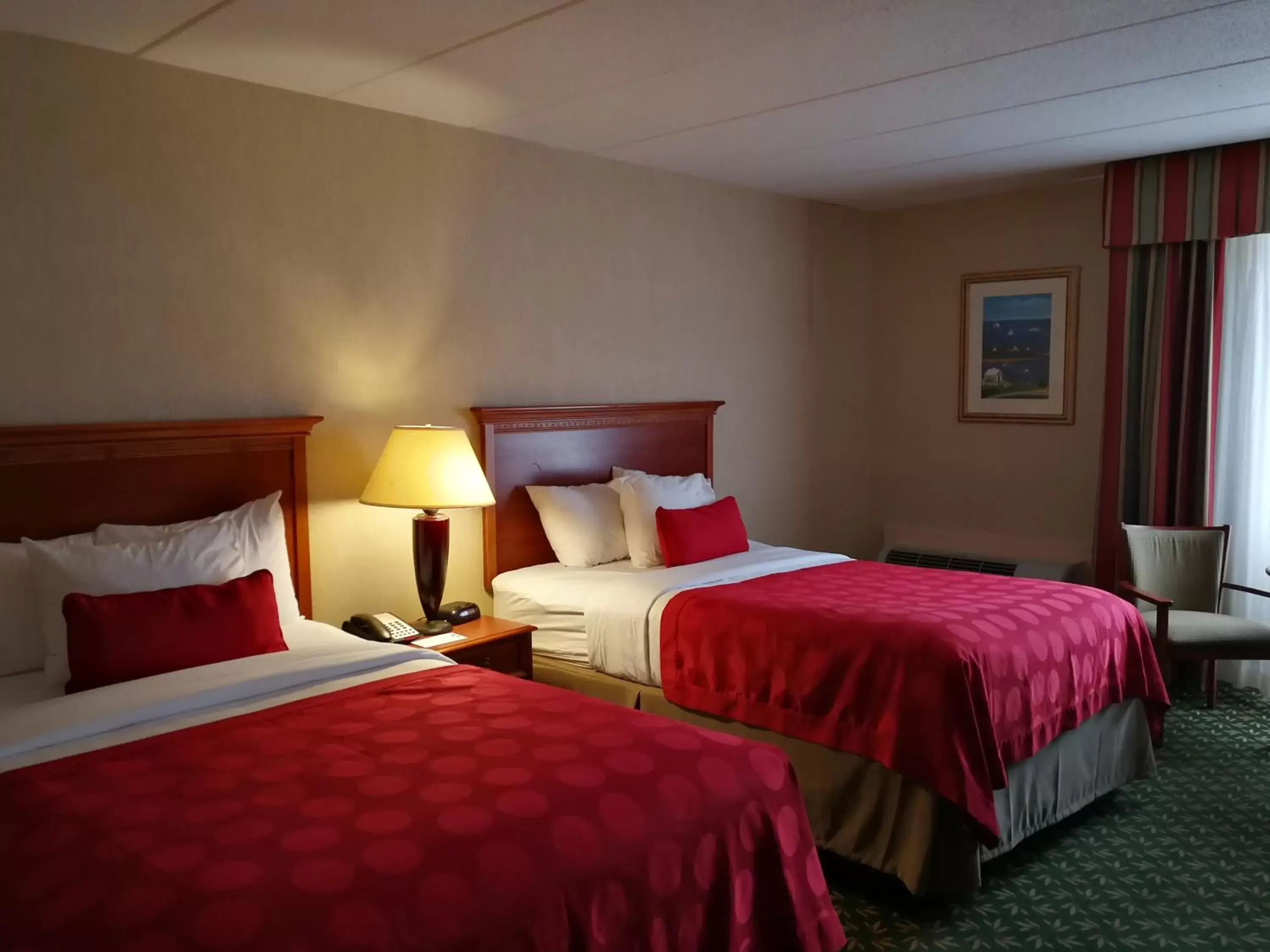 Bed in Mystic River Hotel & Suites