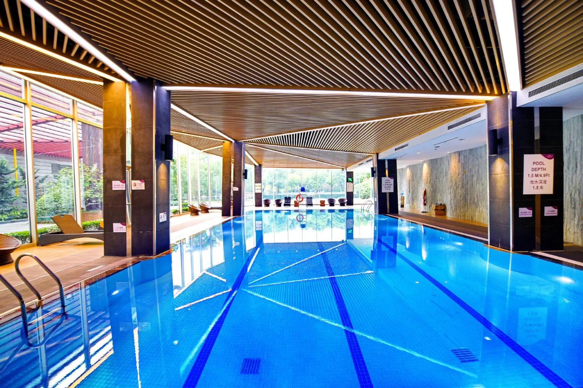 Swimming pool in Crowne Plaza Shanghai Xiayang Lake by IHG