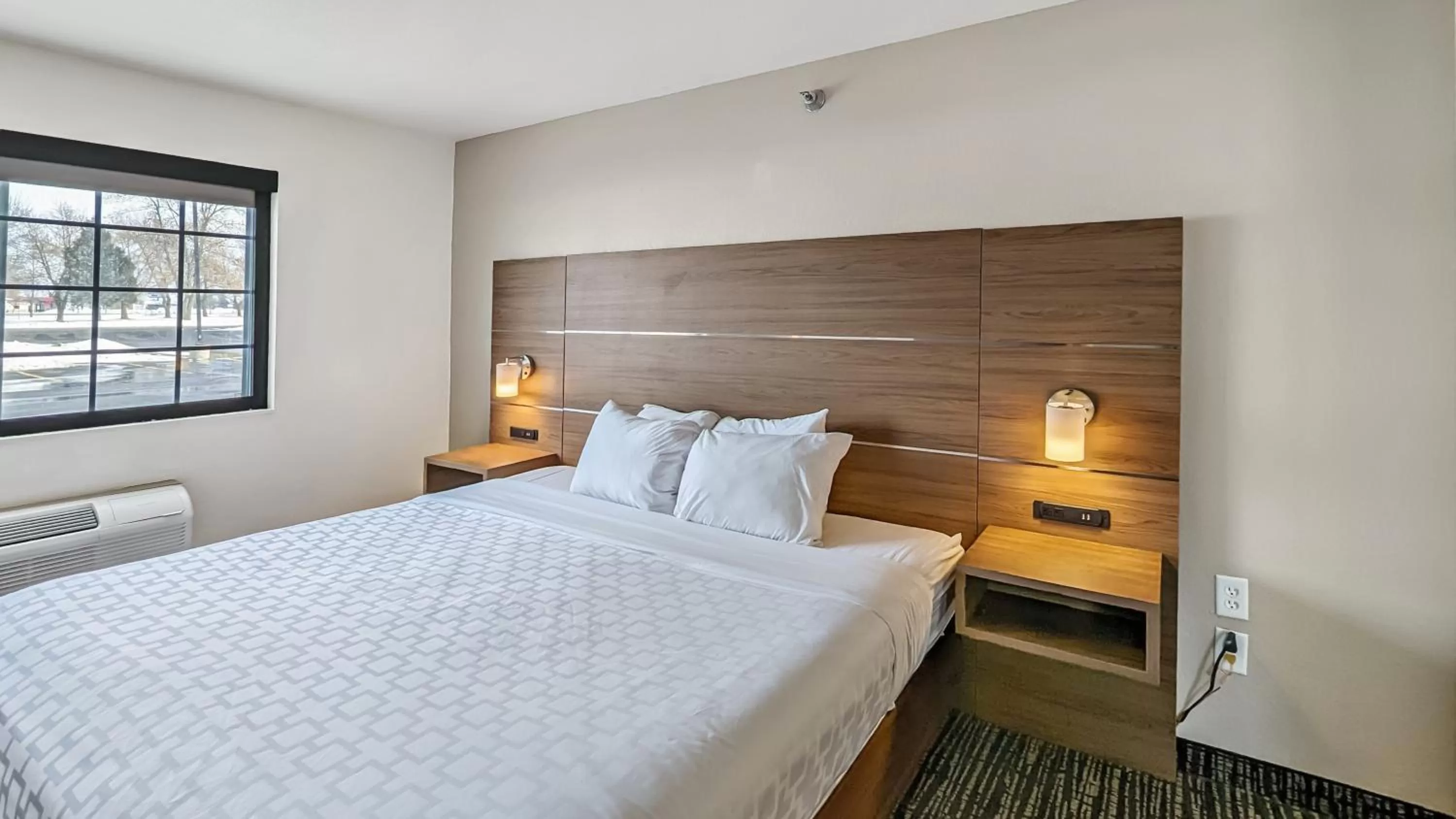 Bed in Estherville Hotel & Suites