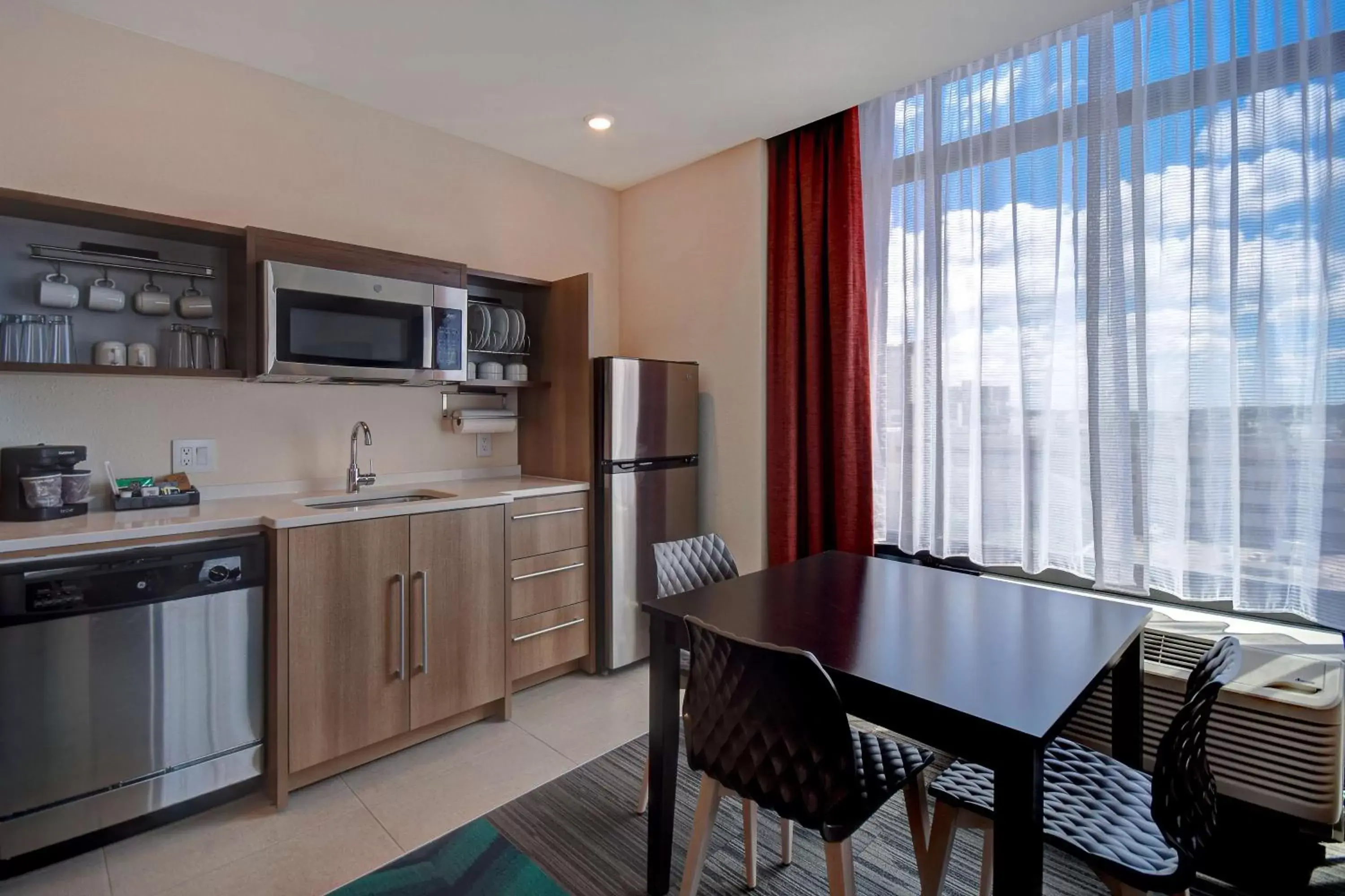 Kitchen or kitchenette, Kitchen/Kitchenette in Home2 Suites By Hilton Kalamazoo Downtown, Mi