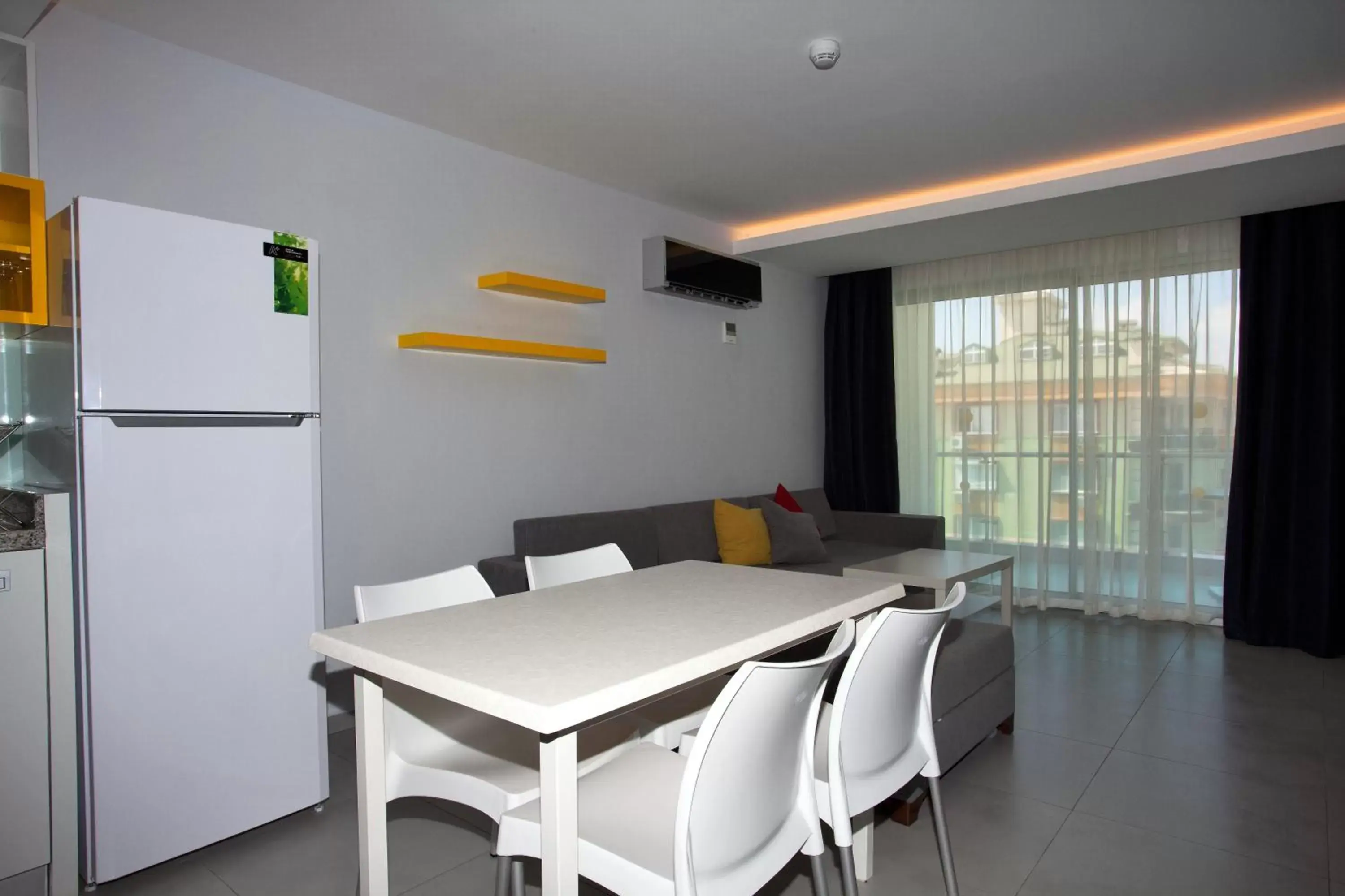 Living room, Dining Area in Green Garden Suites Hotel