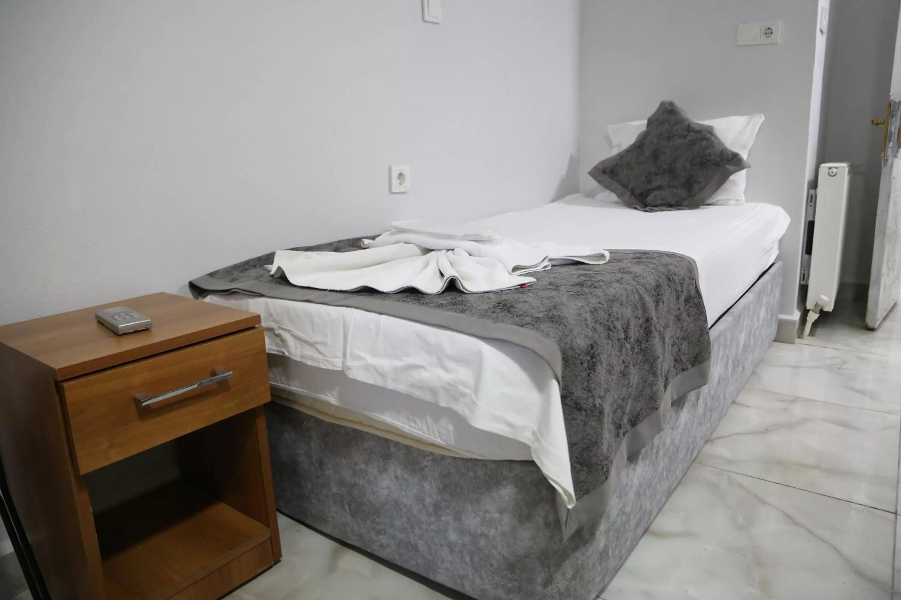Bed in Arat Apartments