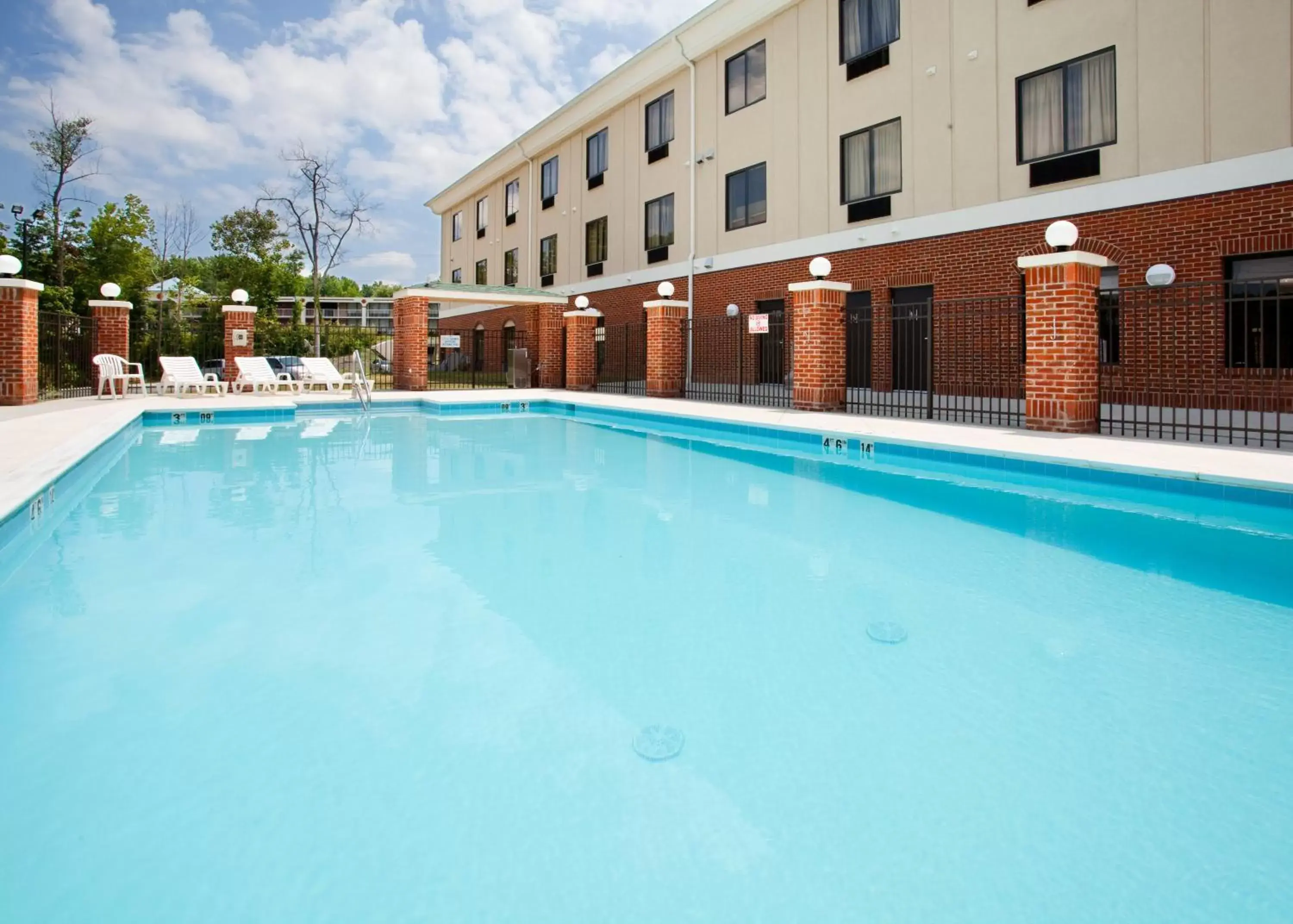 Swimming Pool in Holiday Inn Express Hotel & Suites Greensboro-East, an IHG Hotel