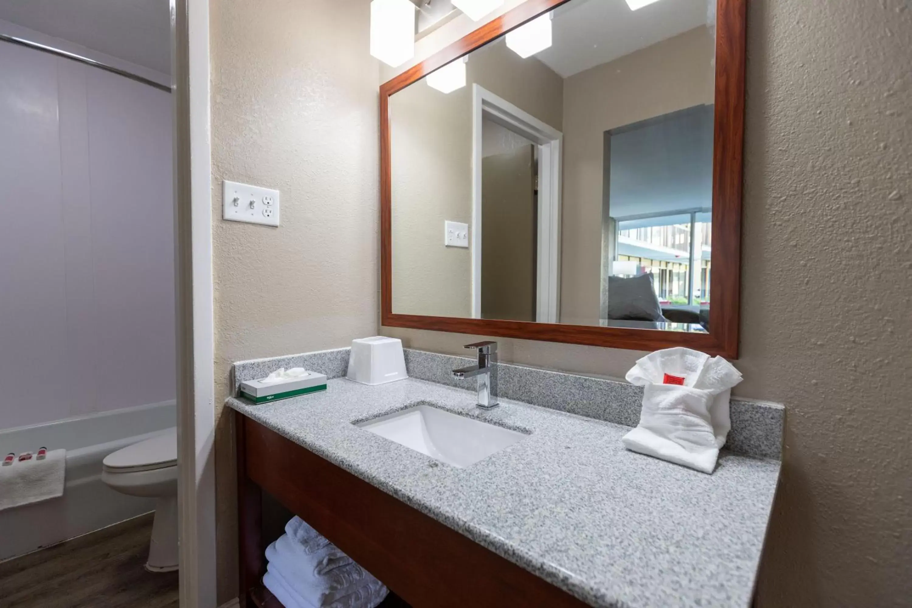 Bathroom in Super 8 by Wyndham Goldsboro