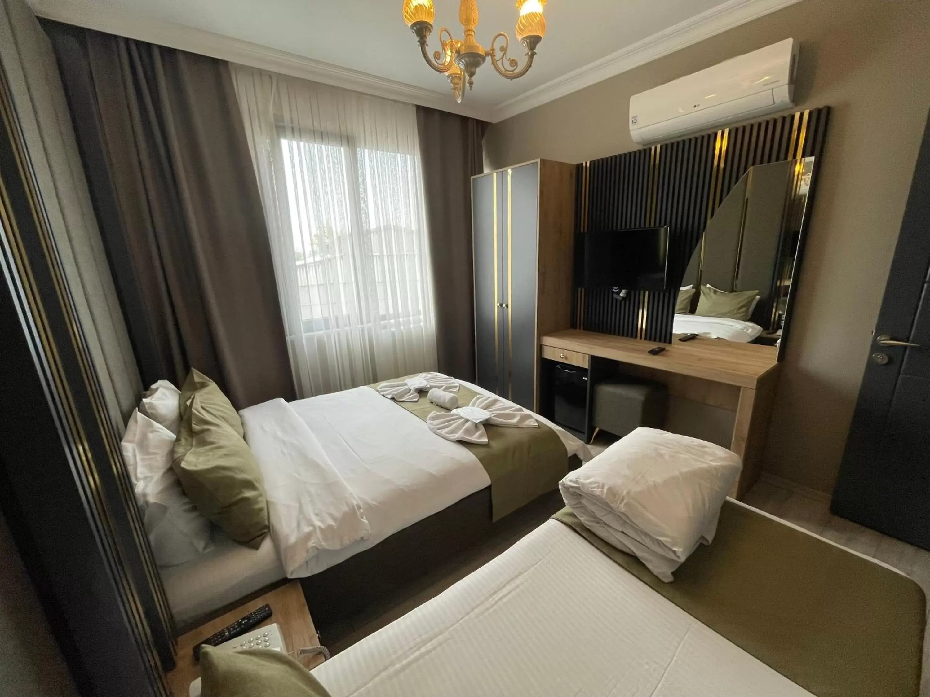 TV and multimedia, Bed in New Taksim Hotel