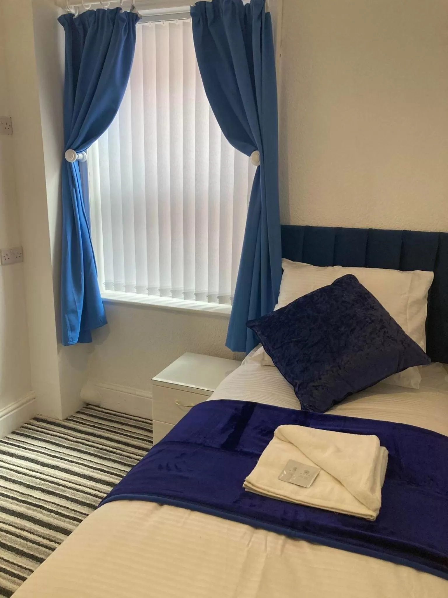 Bed in The New Astoria Hotel