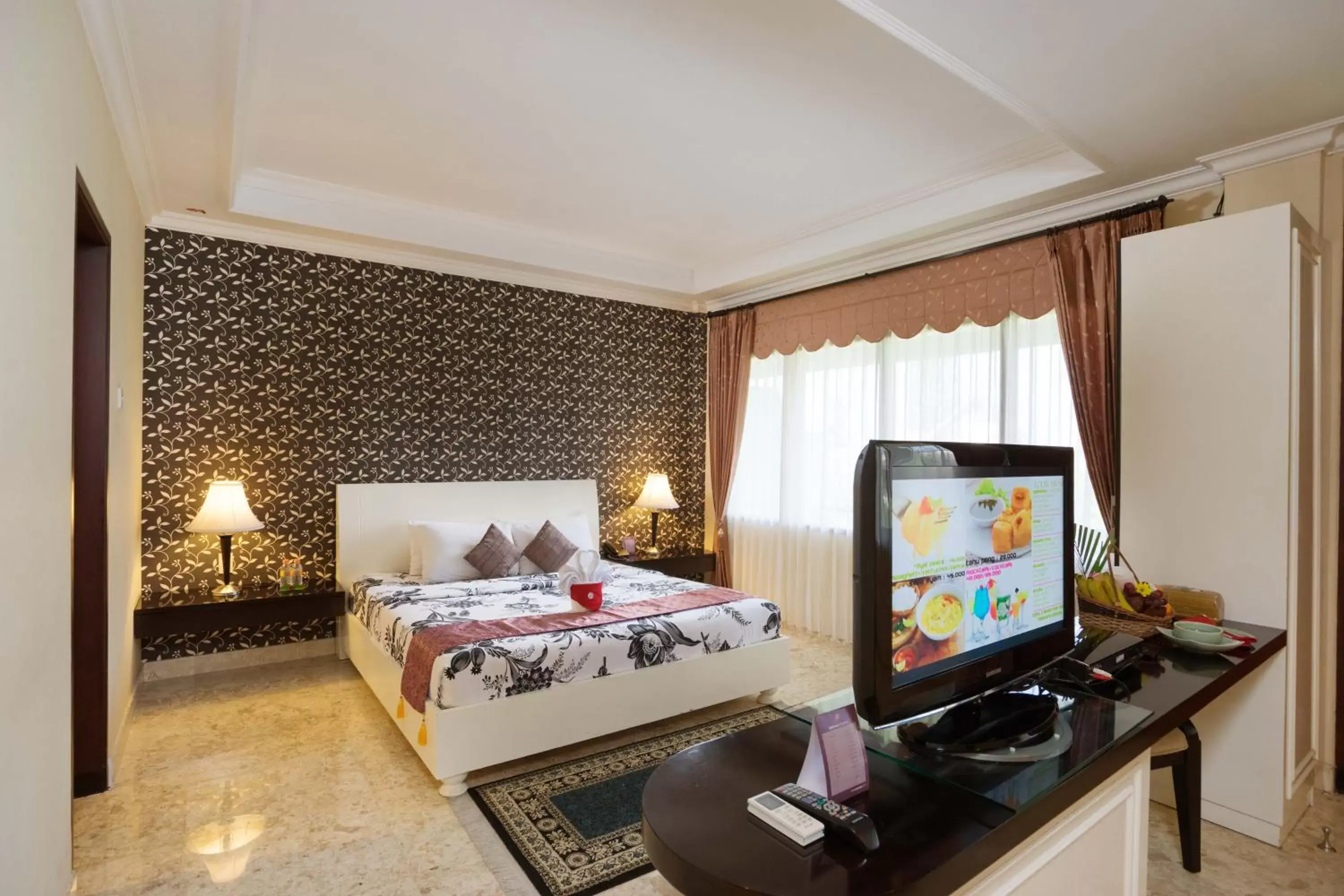 TV and multimedia in Royal Orchids Garden Hotel & Condominium