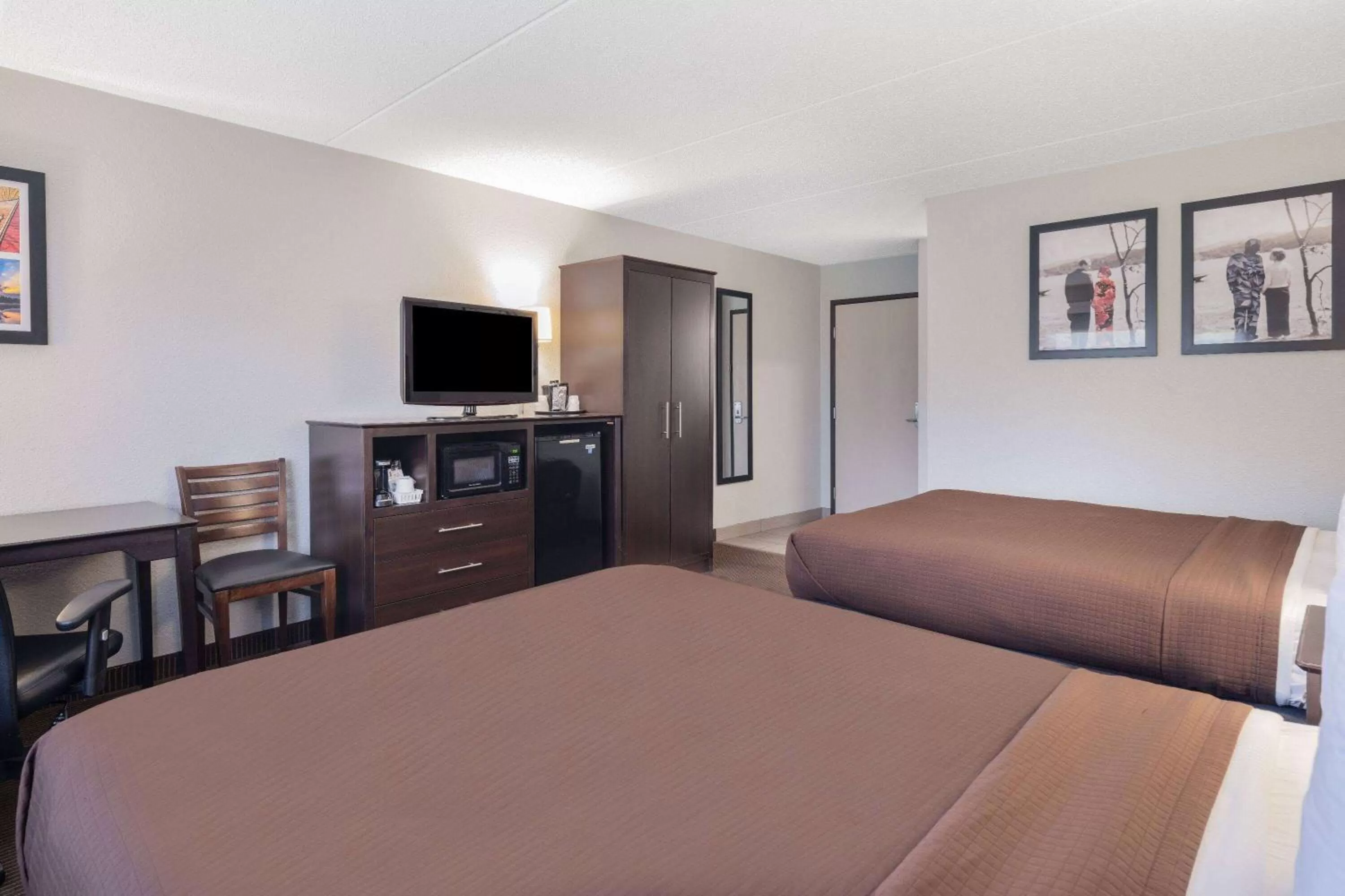 Photo of the whole room, Bed in AmericInn by Wyndham Plover Stevens Point