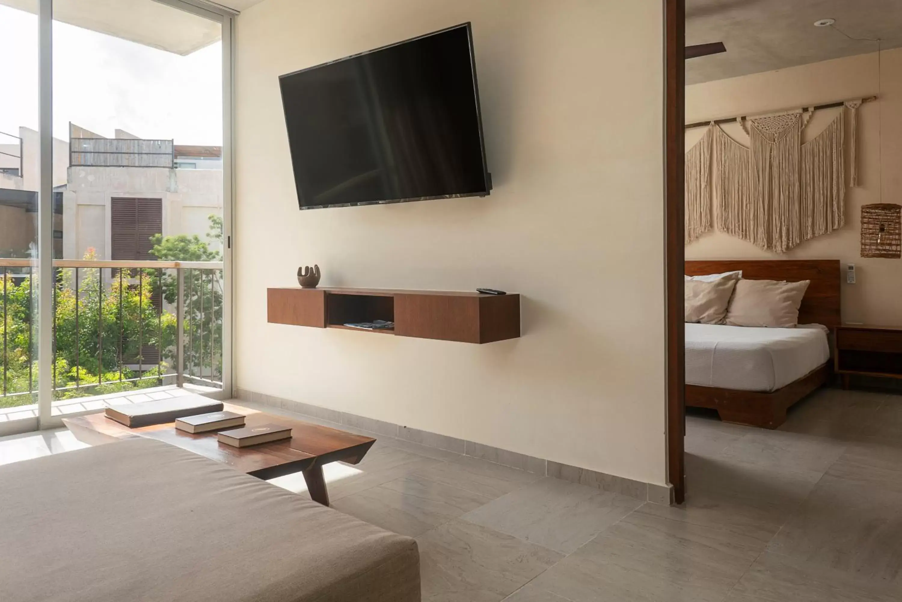 Communal lounge/ TV room, TV/Entertainment Center in ARUNA TULUM-Luxury Studios & Apartments