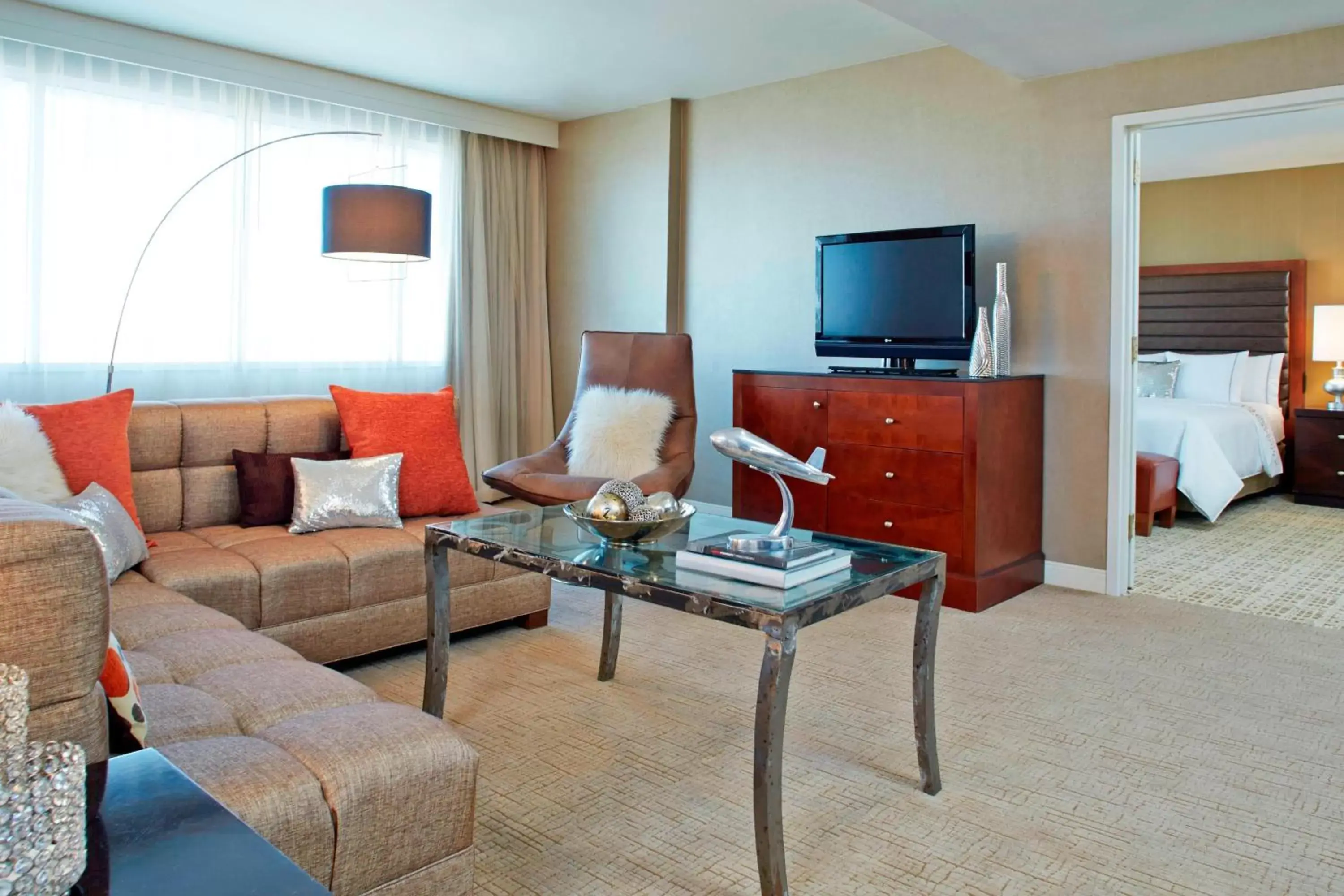 Living room, TV/Entertainment Center in Renaissance St. Louis Airport Hotel