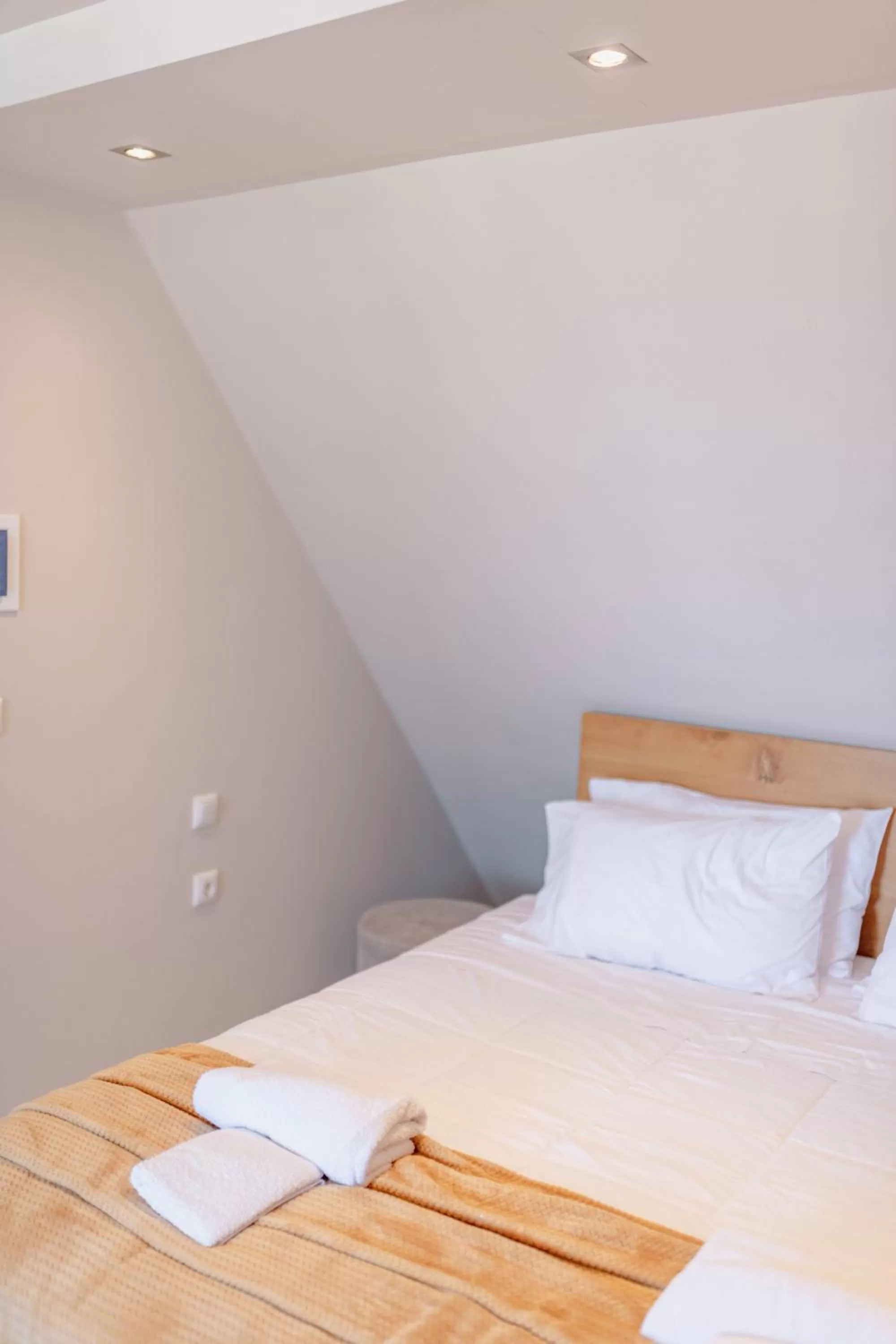 Bed in Zama Suites Collection