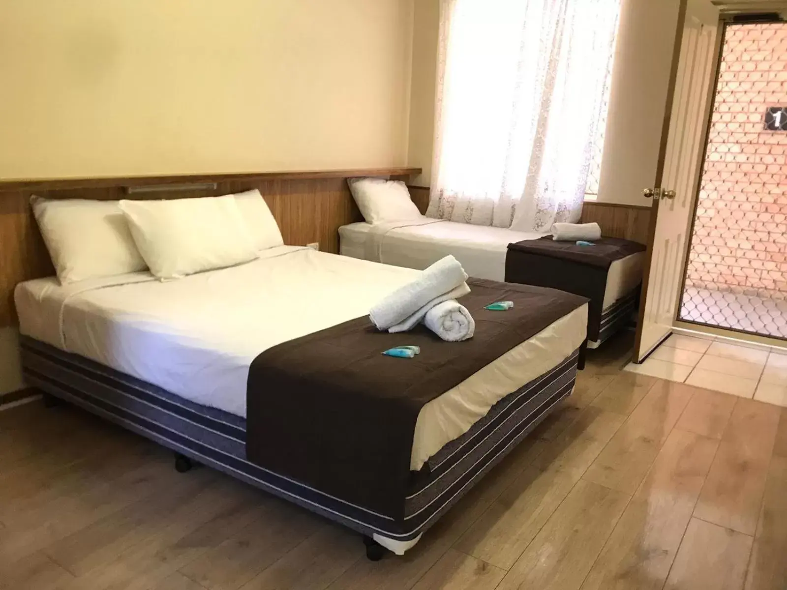 Bed in Angel's Rest Motel