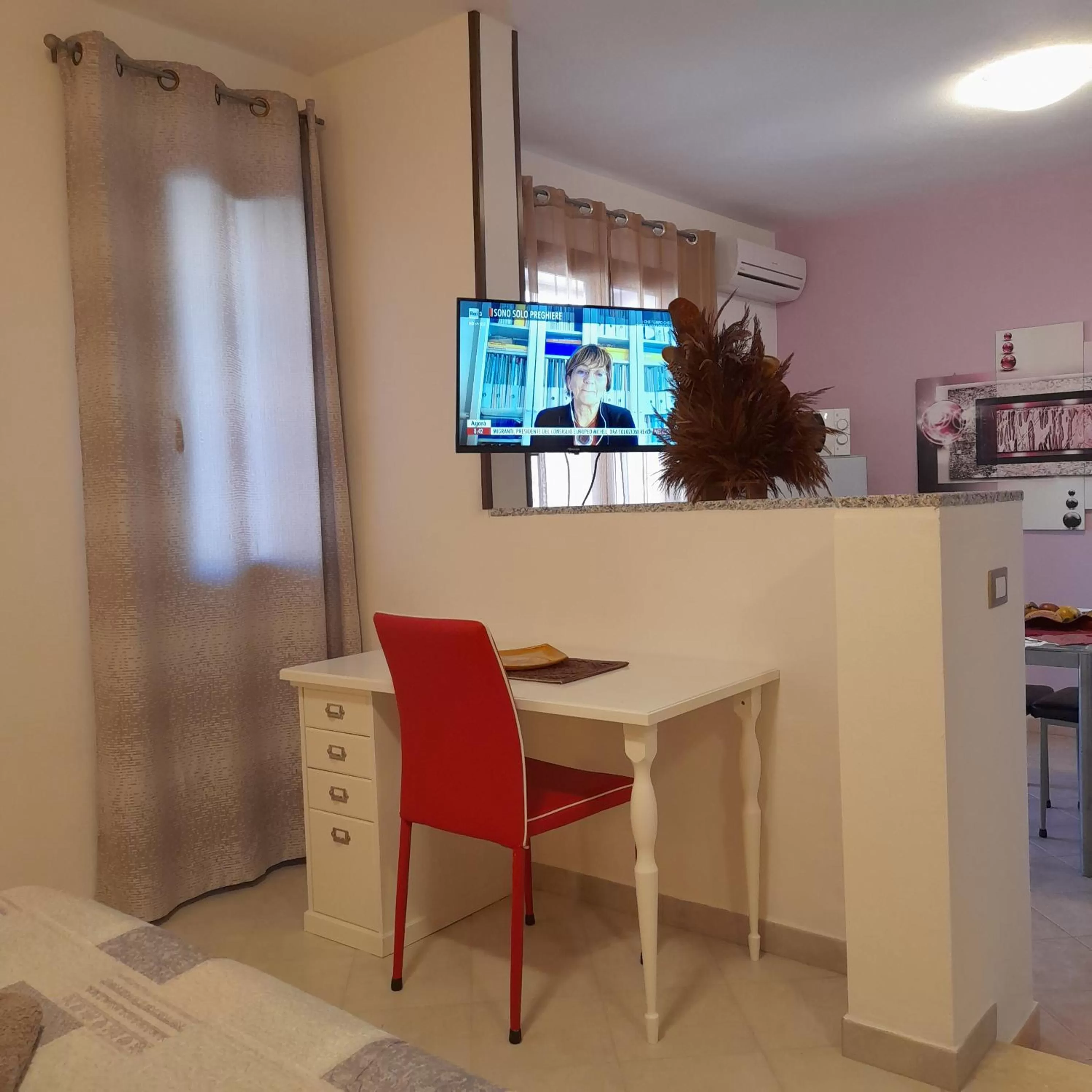 TV and multimedia in La Fortezza casa vacanze & appartament