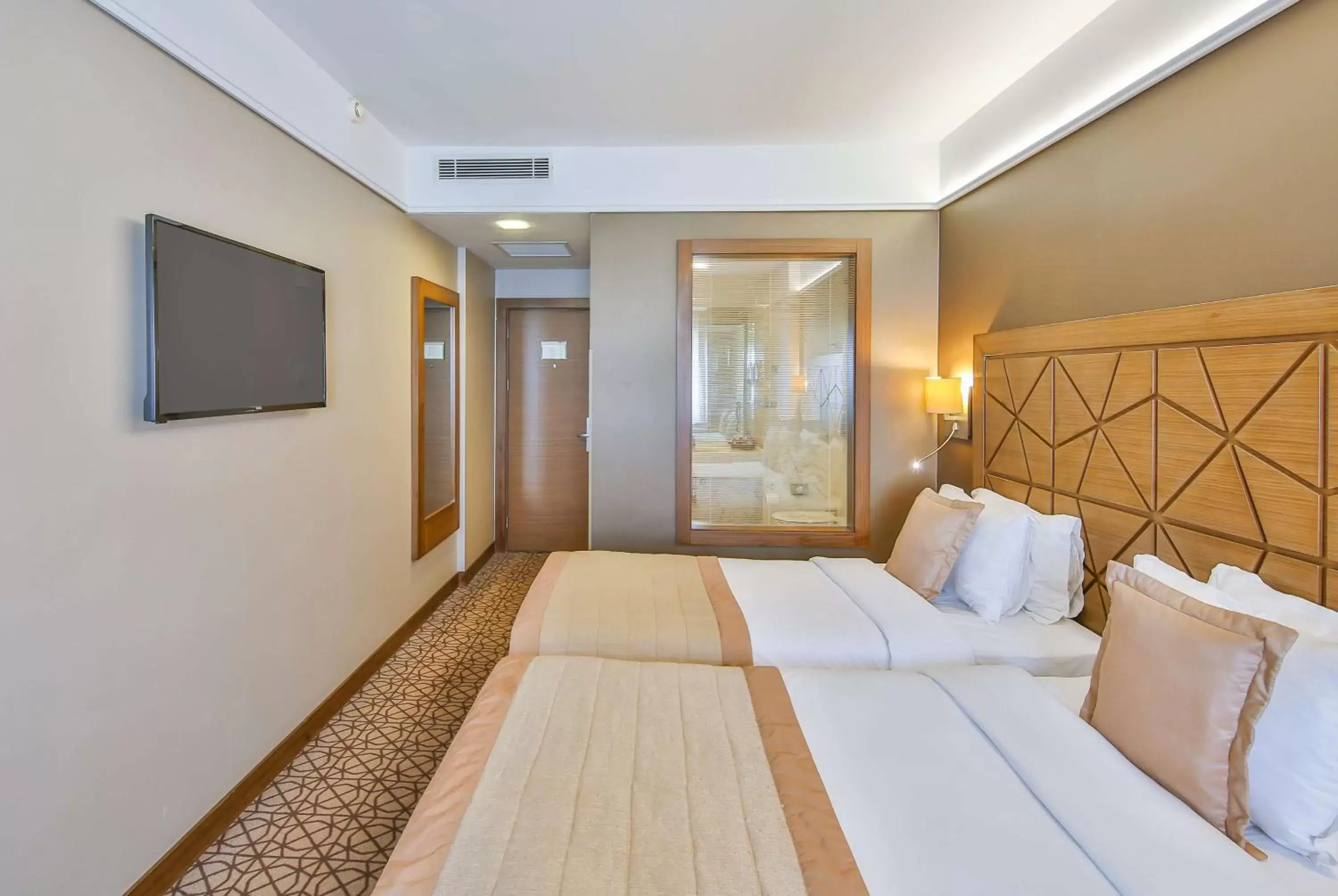 Photo of the whole room, Bed in Ramada By Wyndham İstanbul Taksim