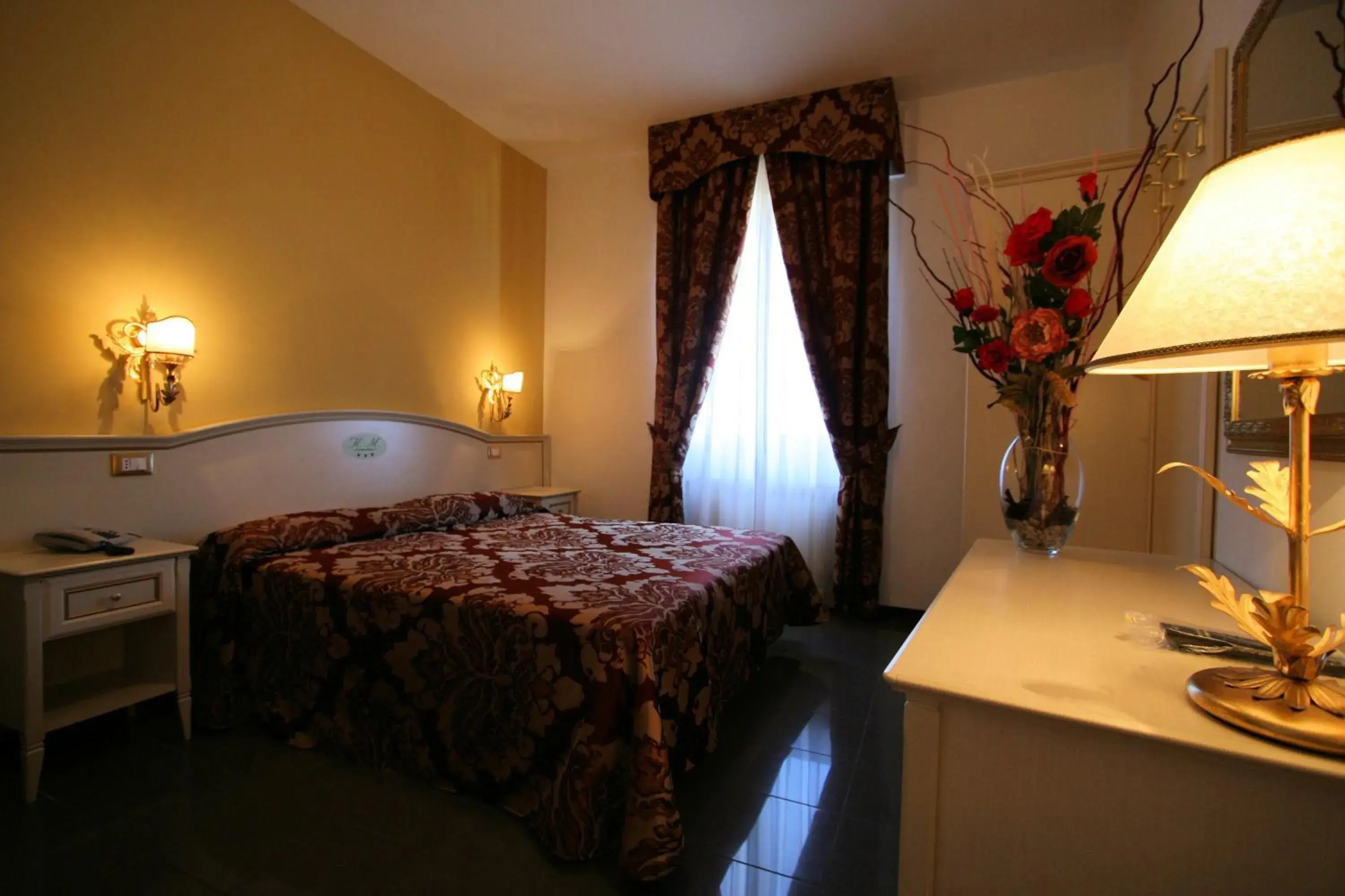 Bed in Hotel La Meridiana