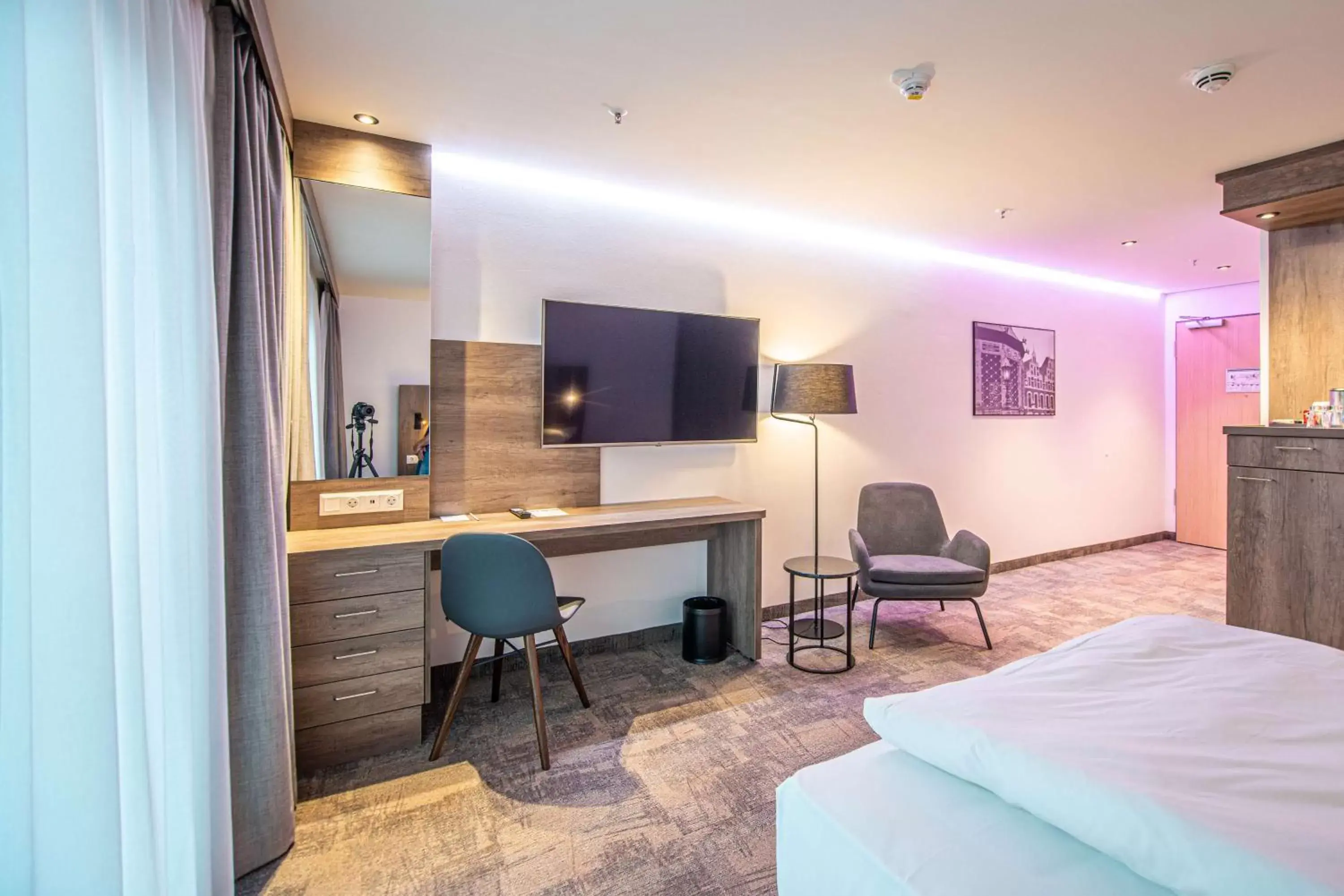 Bedroom, TV/Entertainment Center in Park Inn By Radisson Wismar