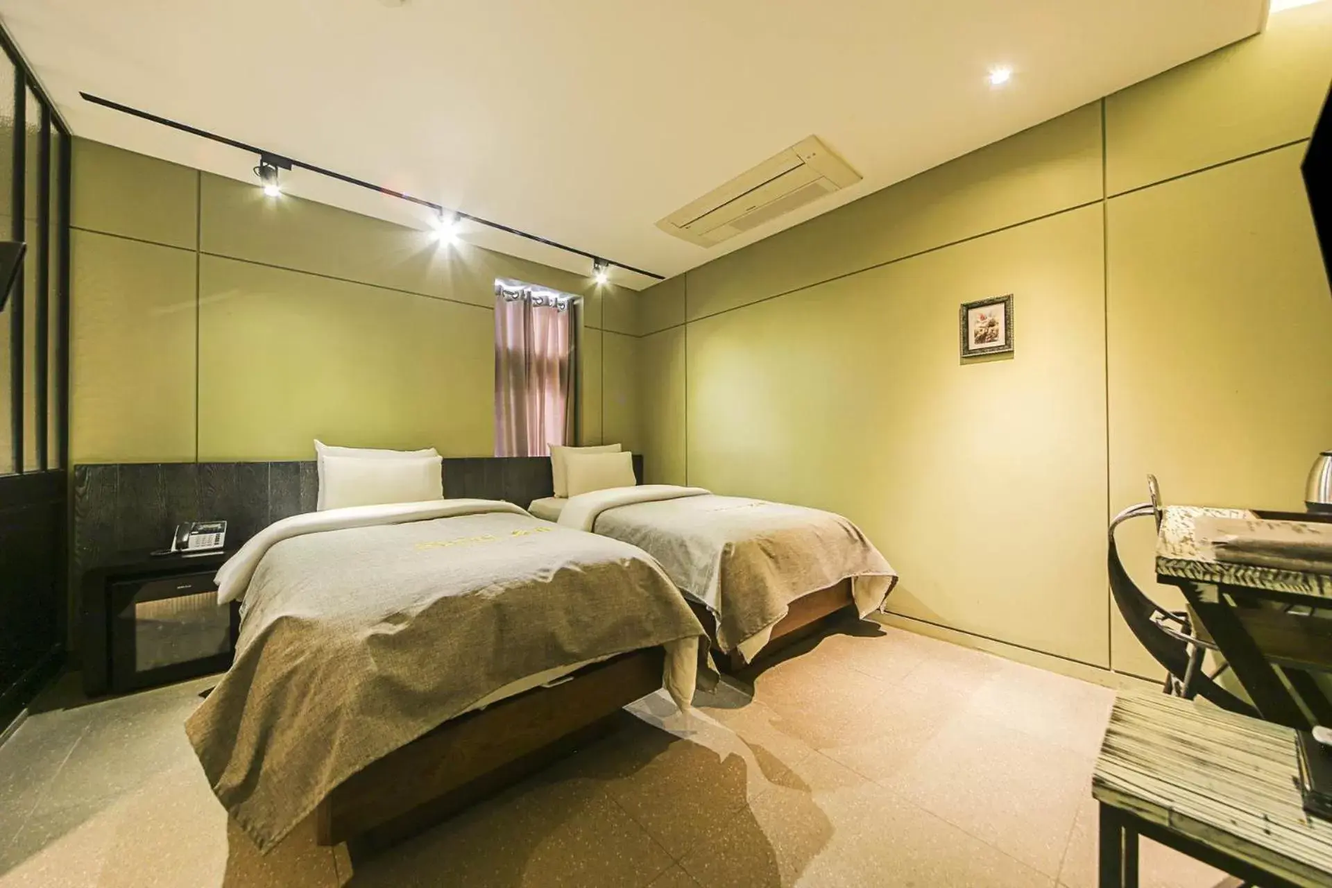 Bed in Hotel Myeongjak