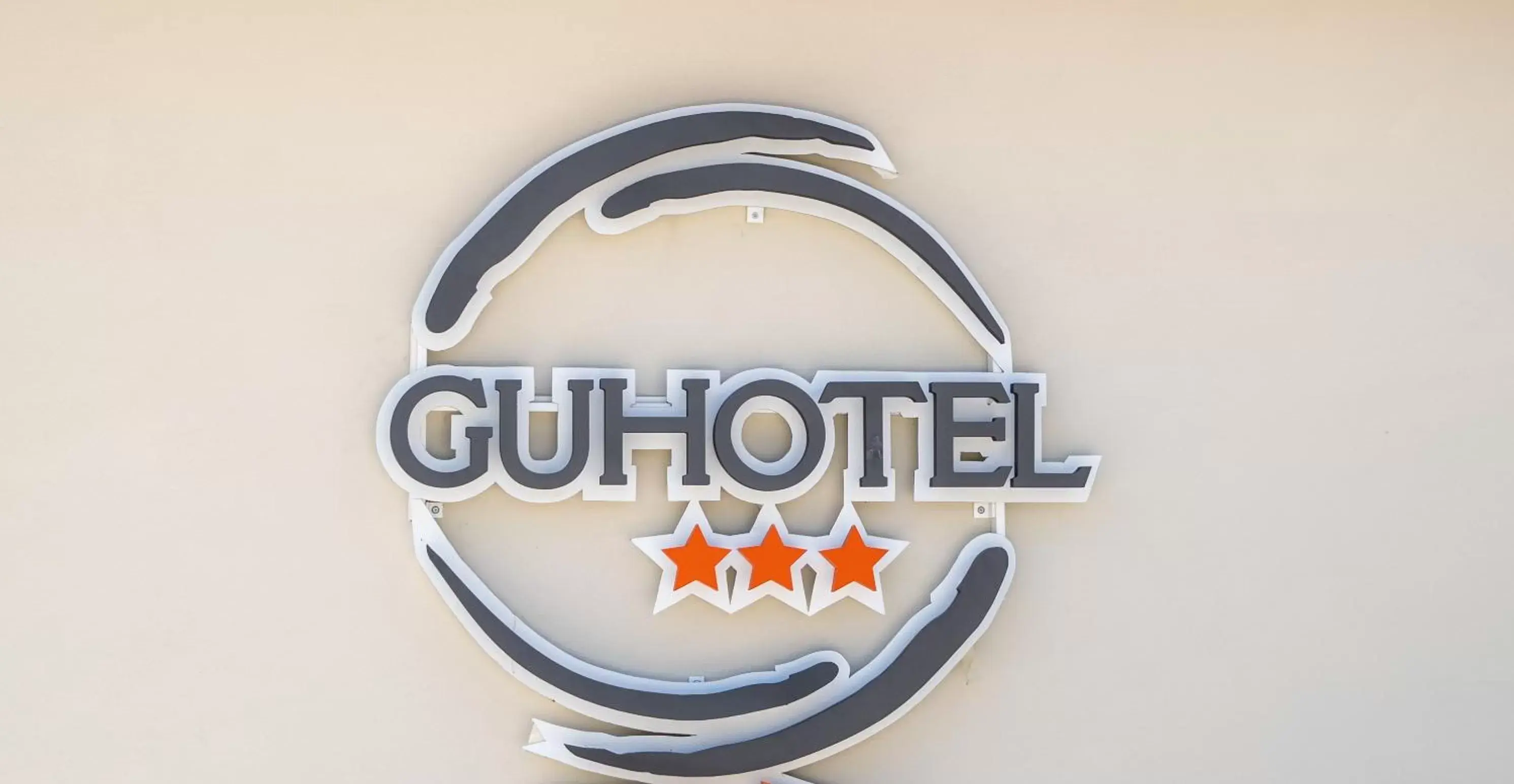 Property logo or sign in Gu Hotel