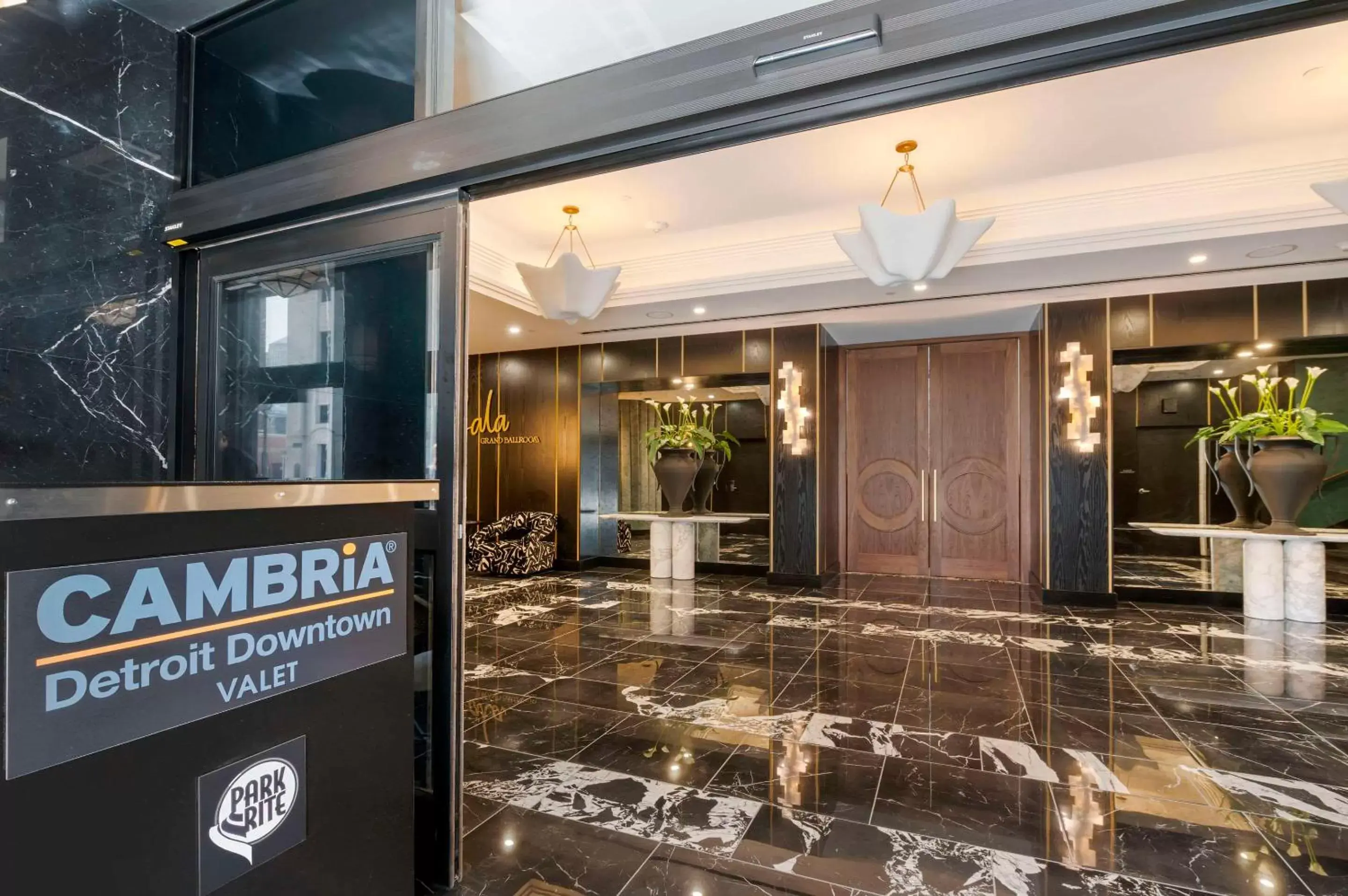 Lobby or reception, Property Logo/Sign in Cambria Hotel Detroit Downtown
