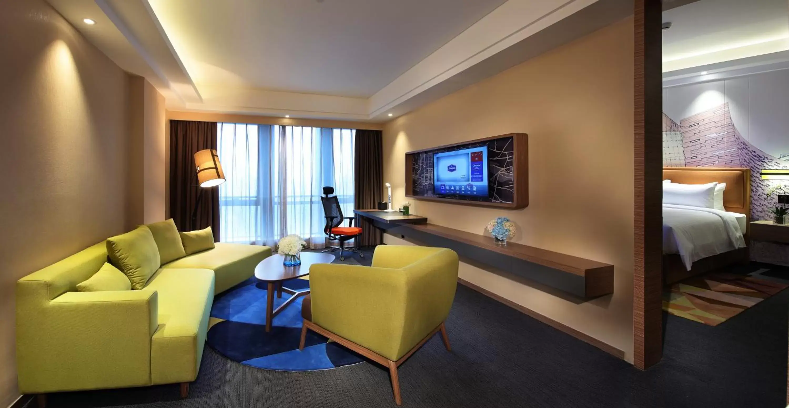 Living room, TV/Entertainment Center in Hampton by Hilton Guangzhou Zhujiang New Town