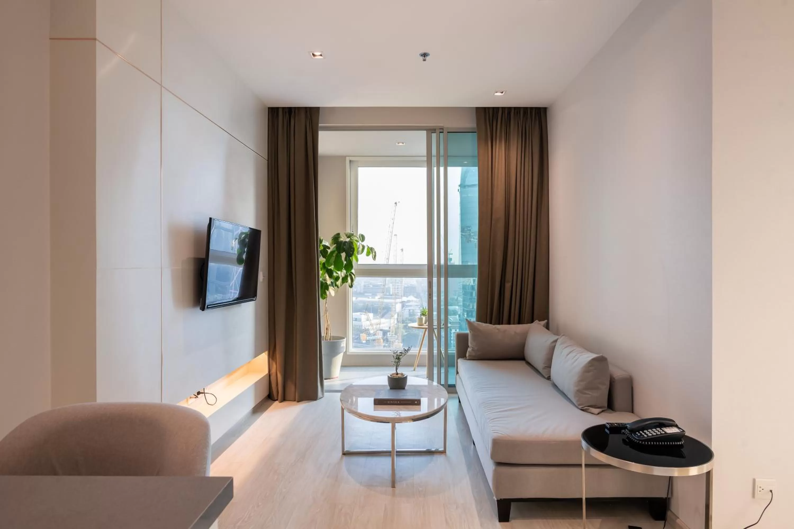 Living room, Bed in Jasmine 59 Hotel