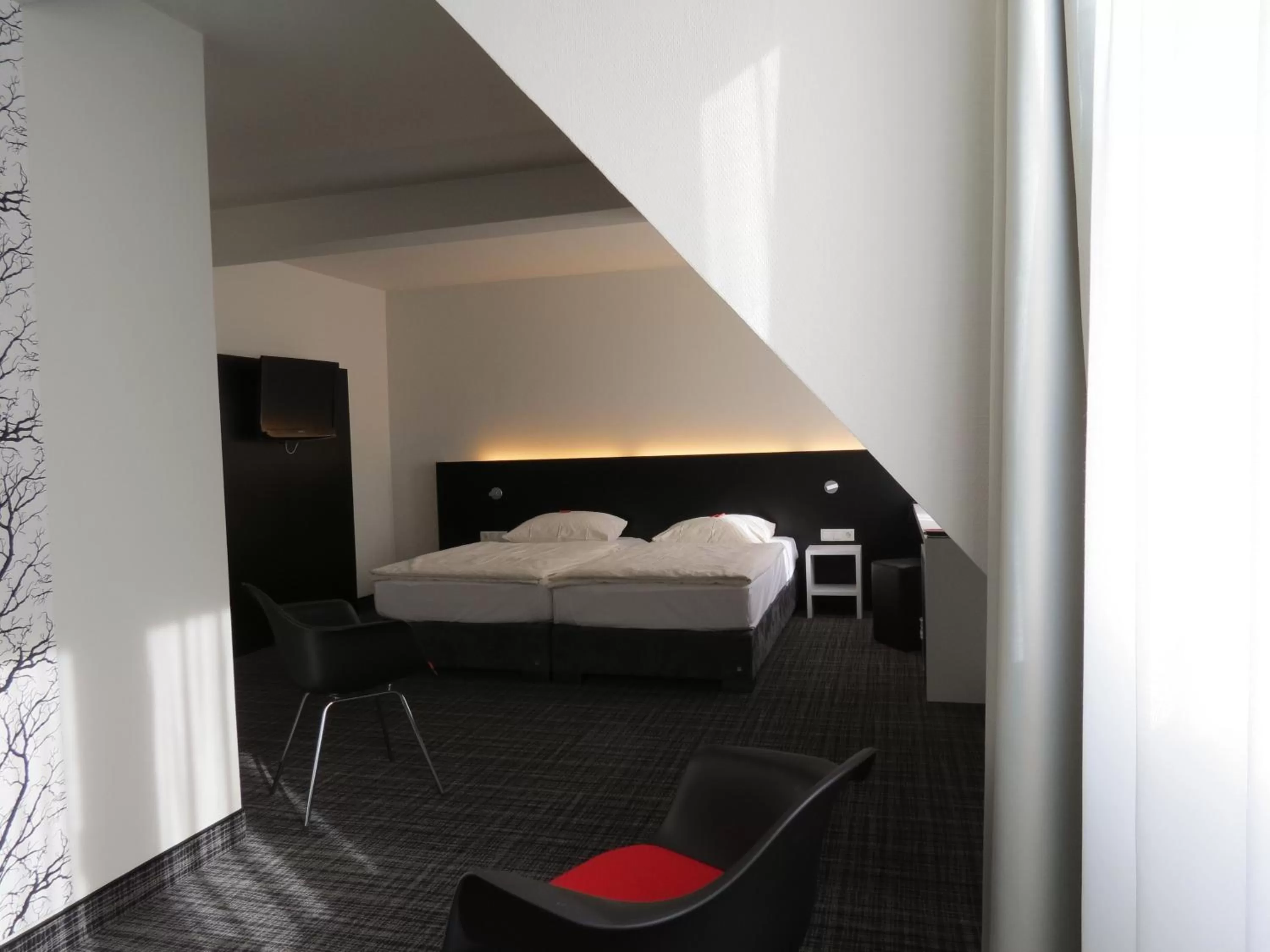 Photo of the whole room, Bed in Comfor Hotel Ulm City