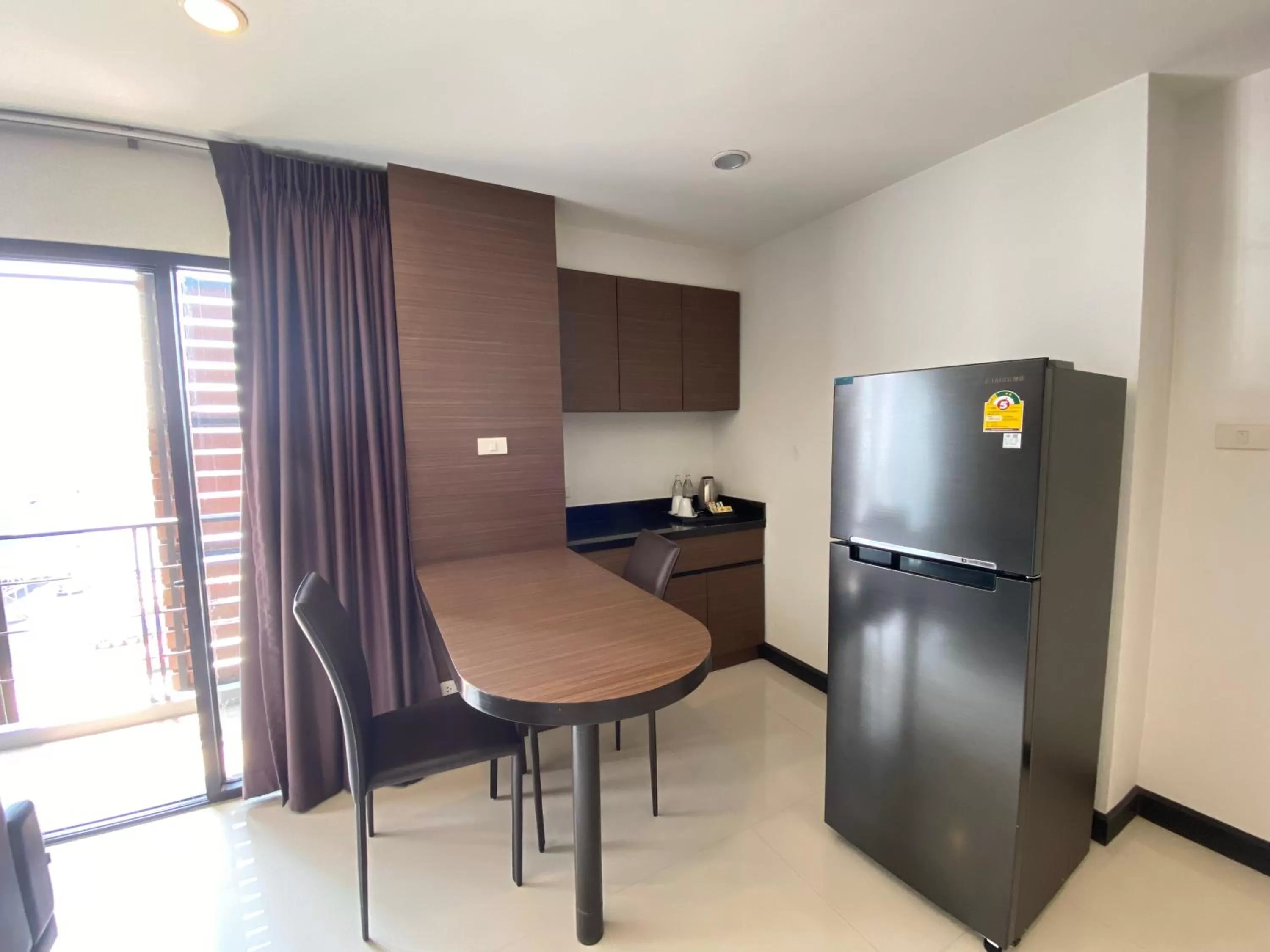 Kitchen or kitchenette in Le Vernissage by Goad Avadhess Hospitality