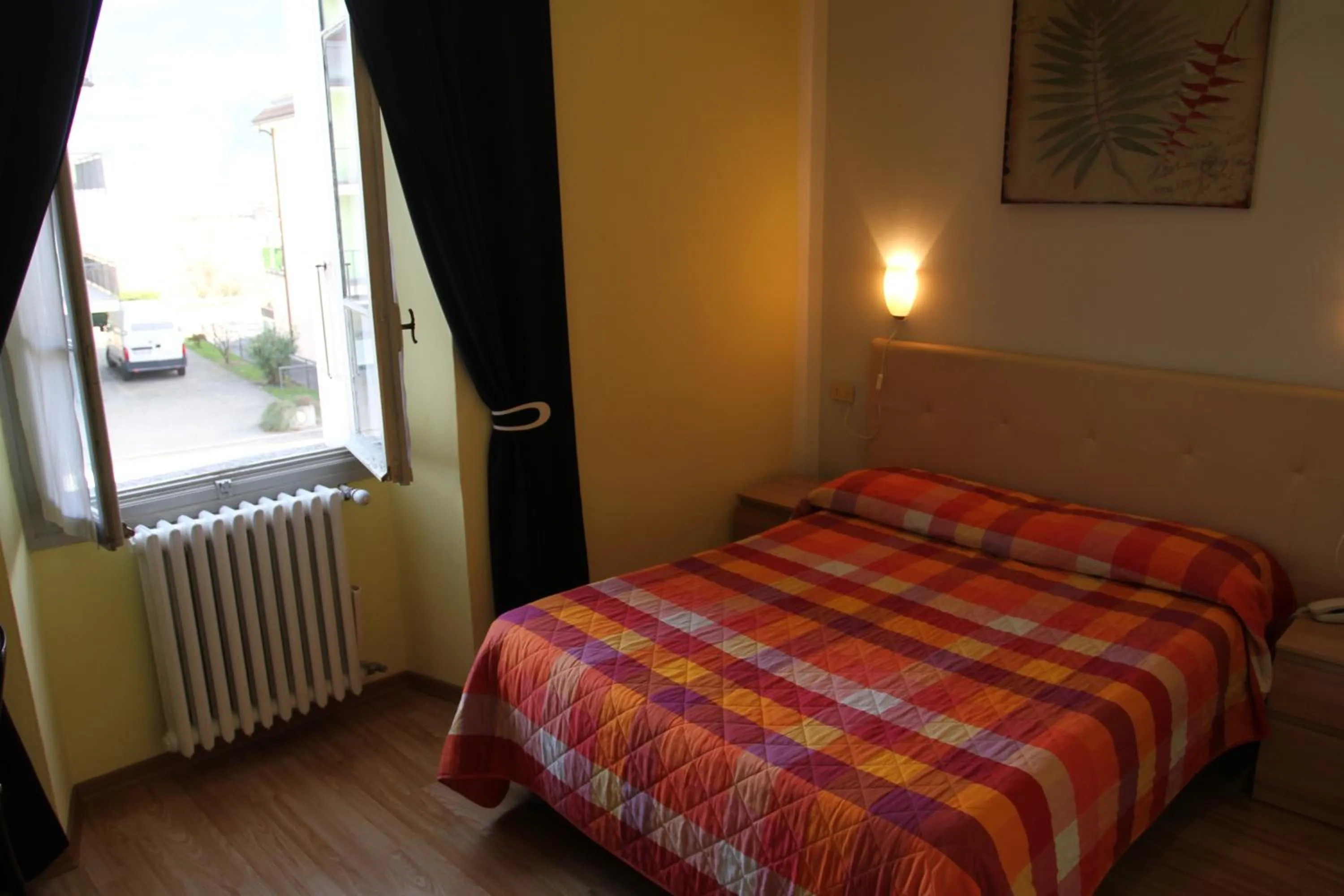 Bed in Hotel Domodossola