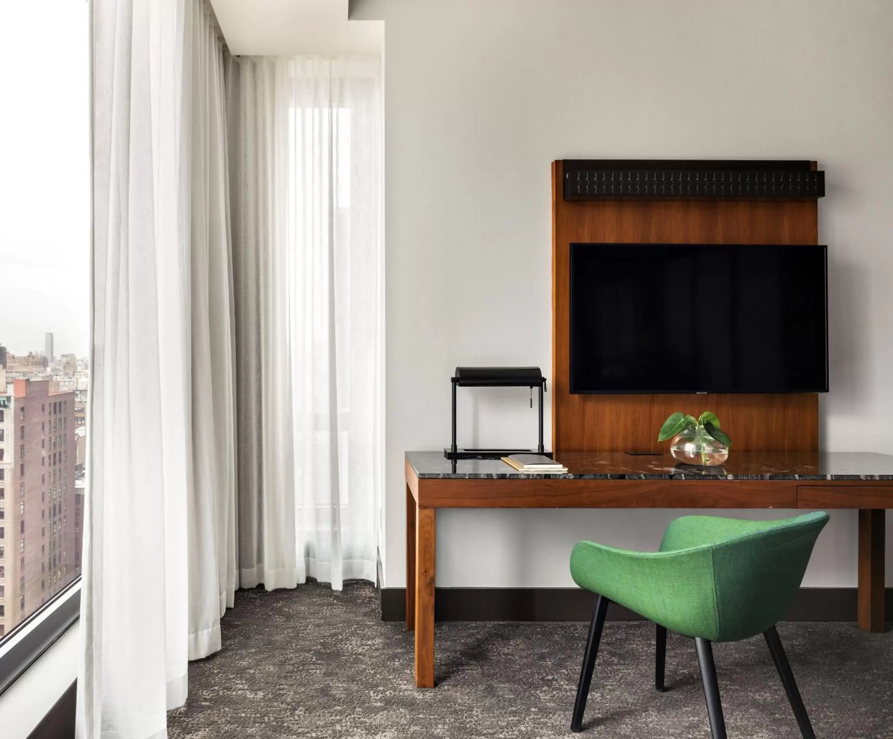Photo of the whole room, TV/Entertainment Center in Kimpton Hotel Eventi, an IHG Hotel