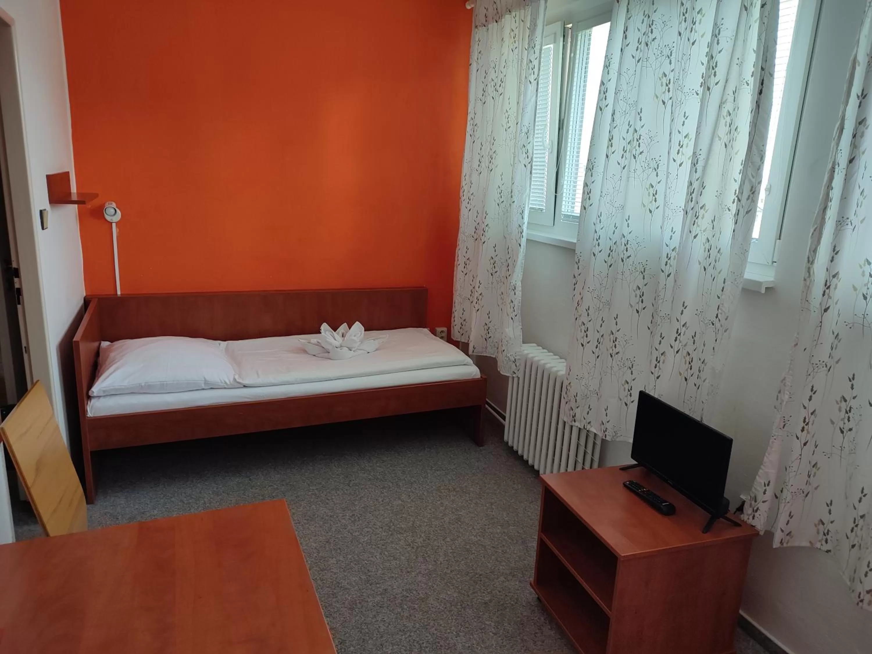 Bed in BEST Hotel Garni
