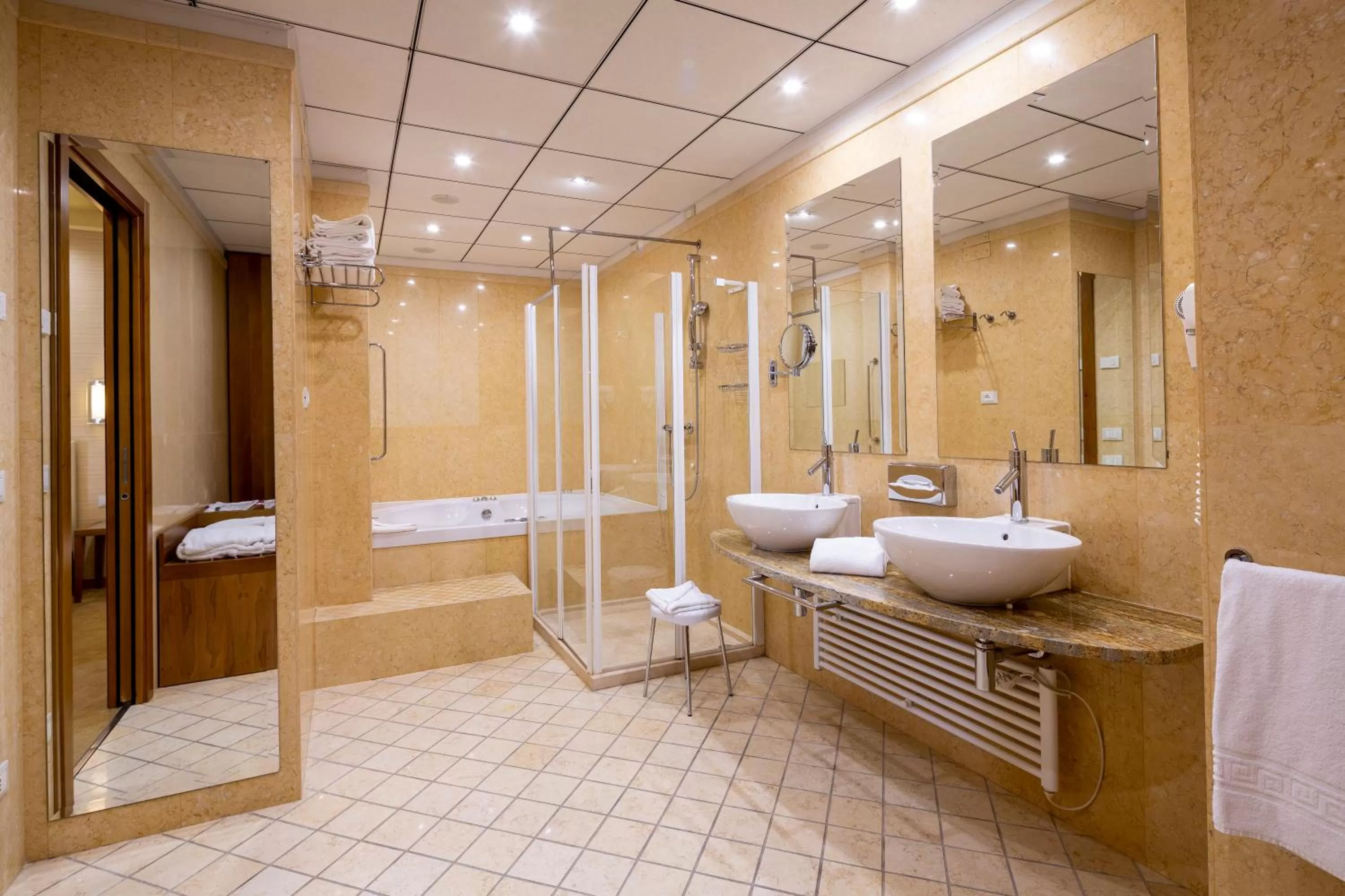 Shower in Crowne Plaza Padova by IHG