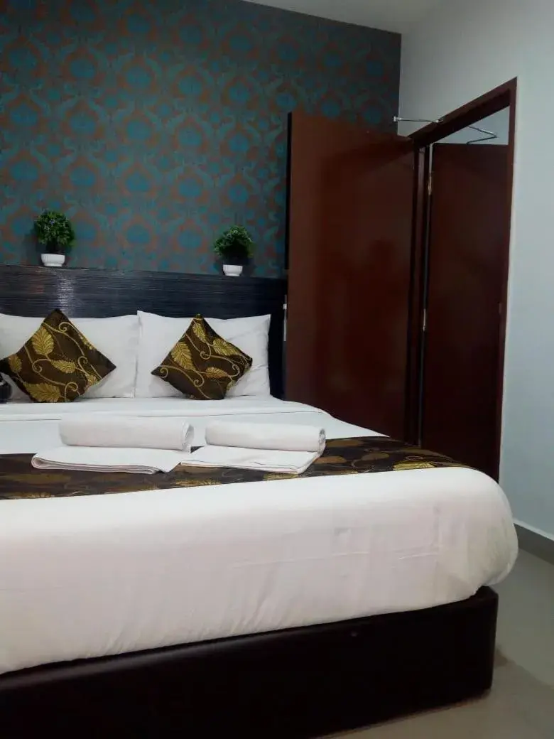 Bed in D'Metro Hotel Bed in D'Metro Hotel