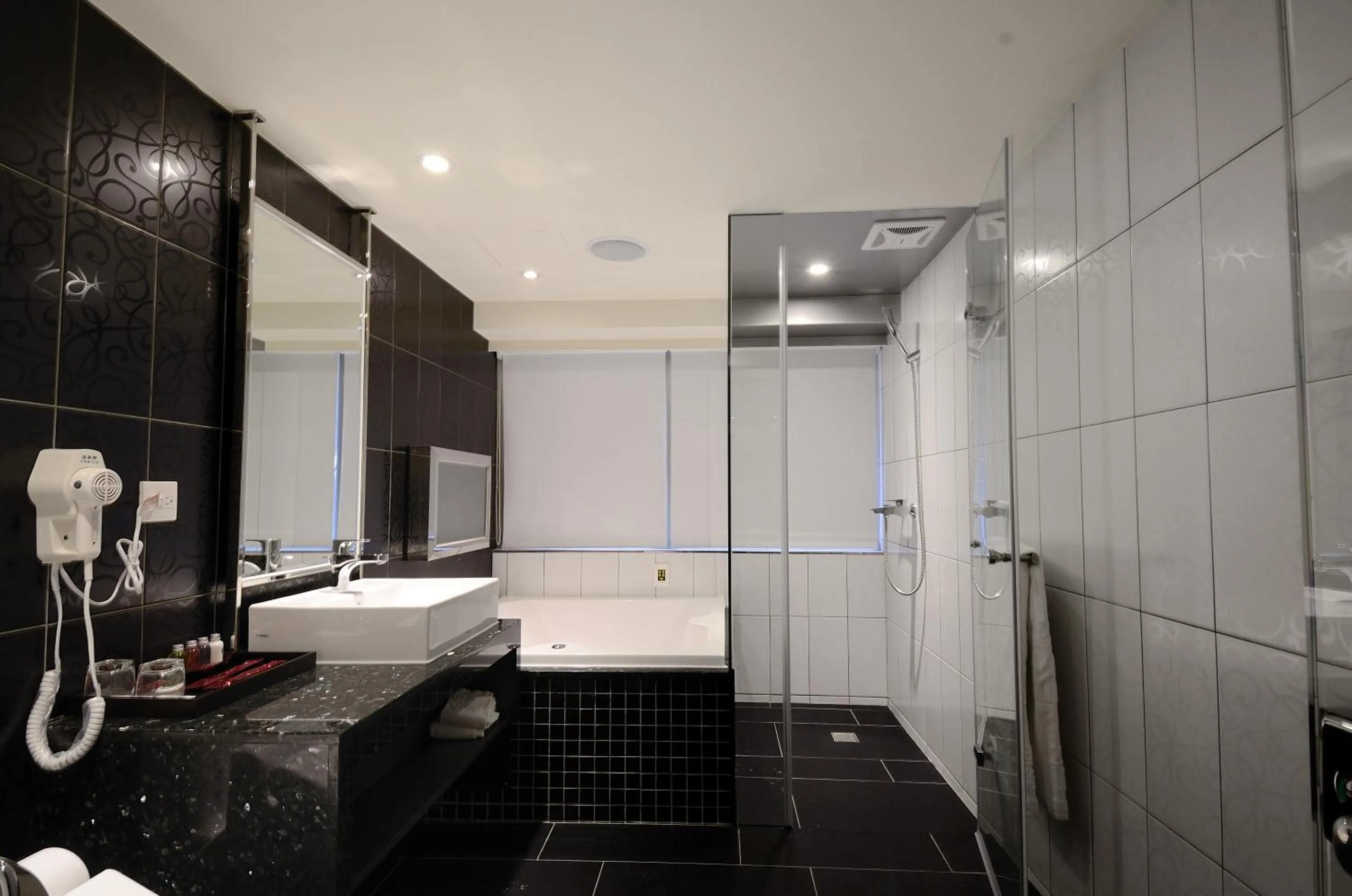 Bathroom in V-one Vogue Hotel