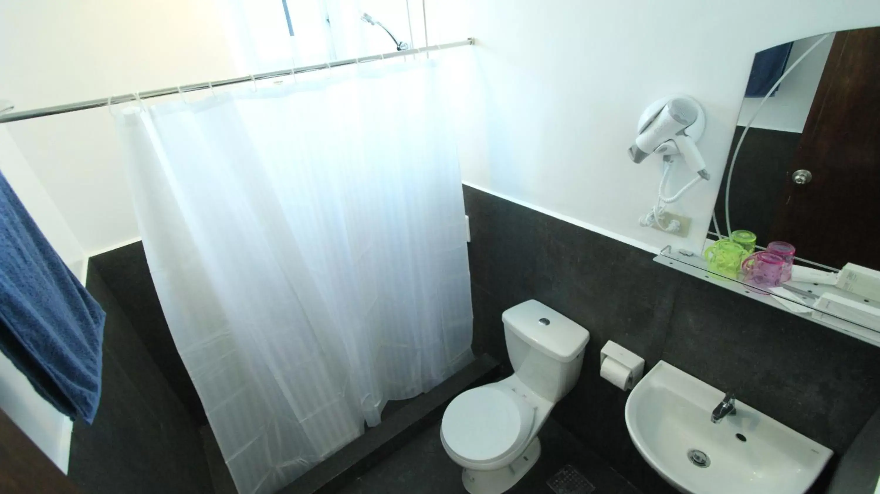 Photo of the whole room, Bathroom in Bluewave Hotel