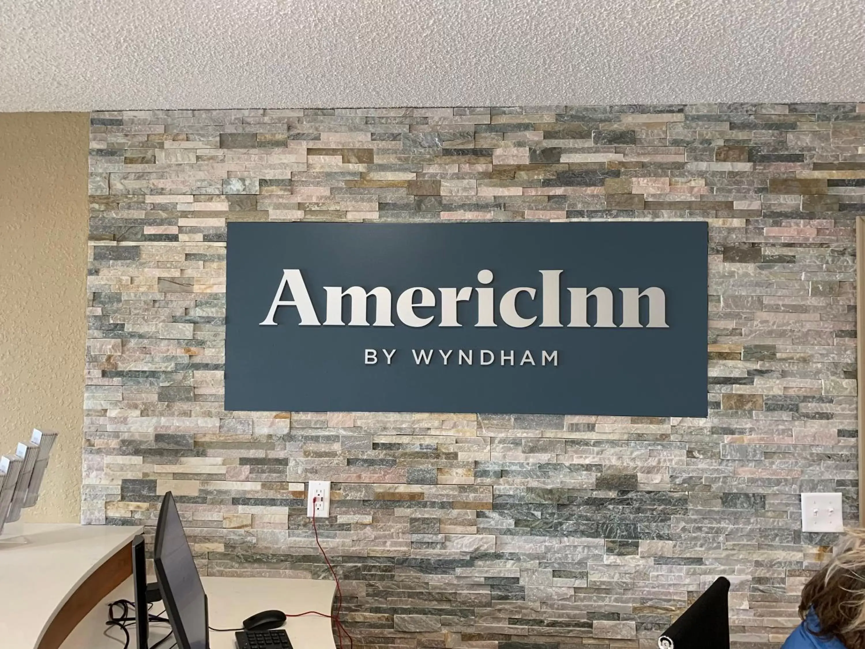Property logo or sign in AmericInn by Wyndham Prairie du Chien