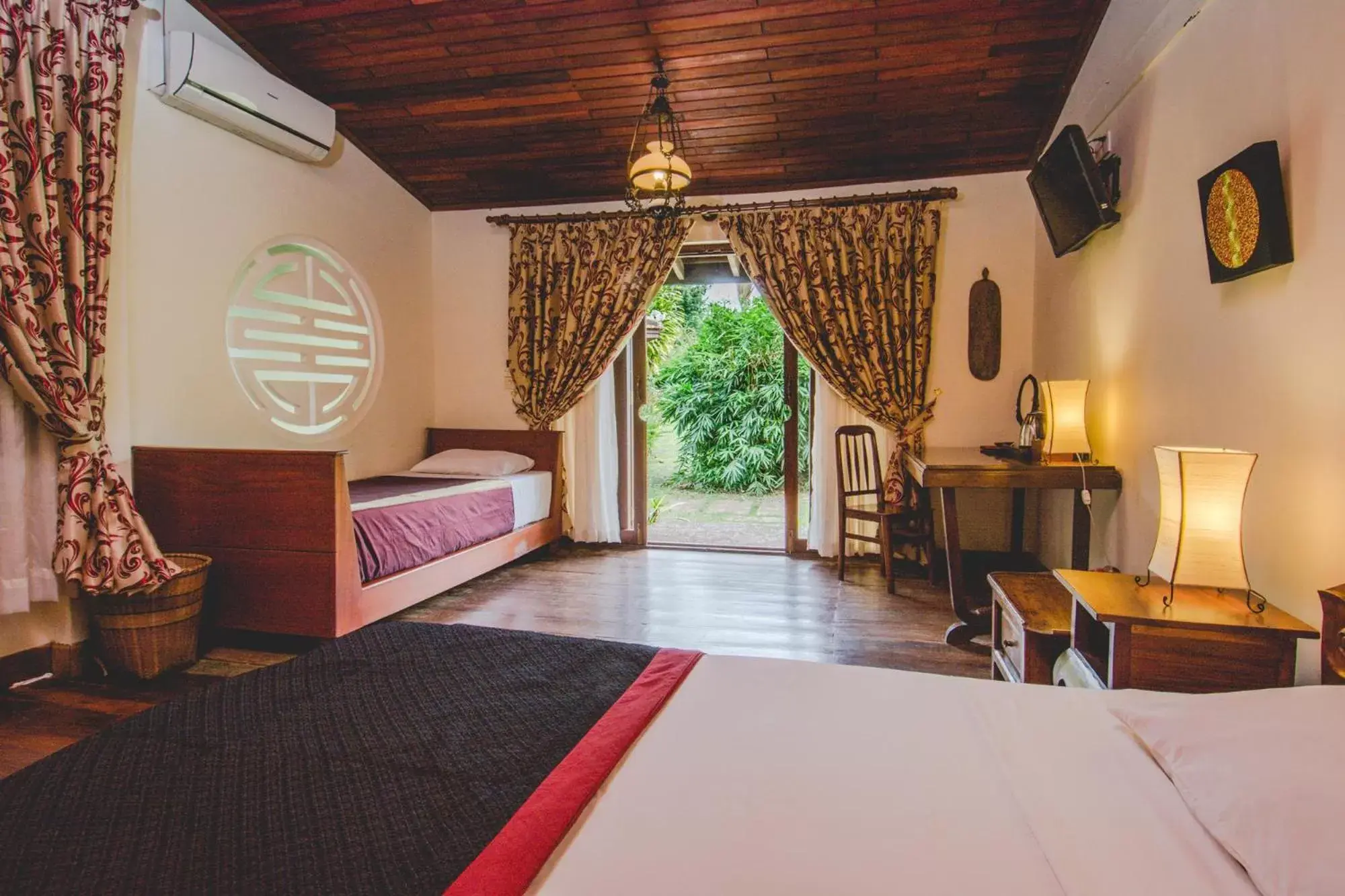 Bed in Terres Rouges Lodge