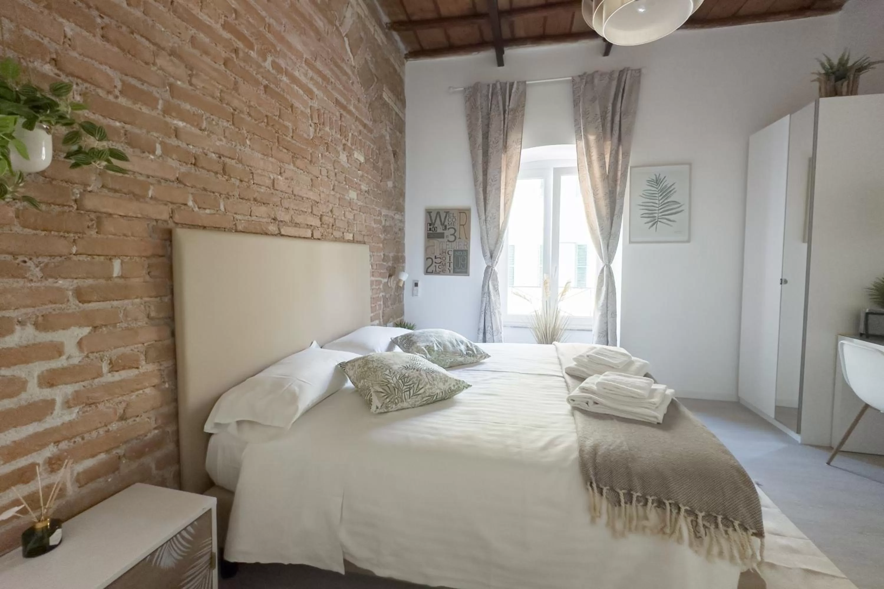 Bed in White Ostilia B&B