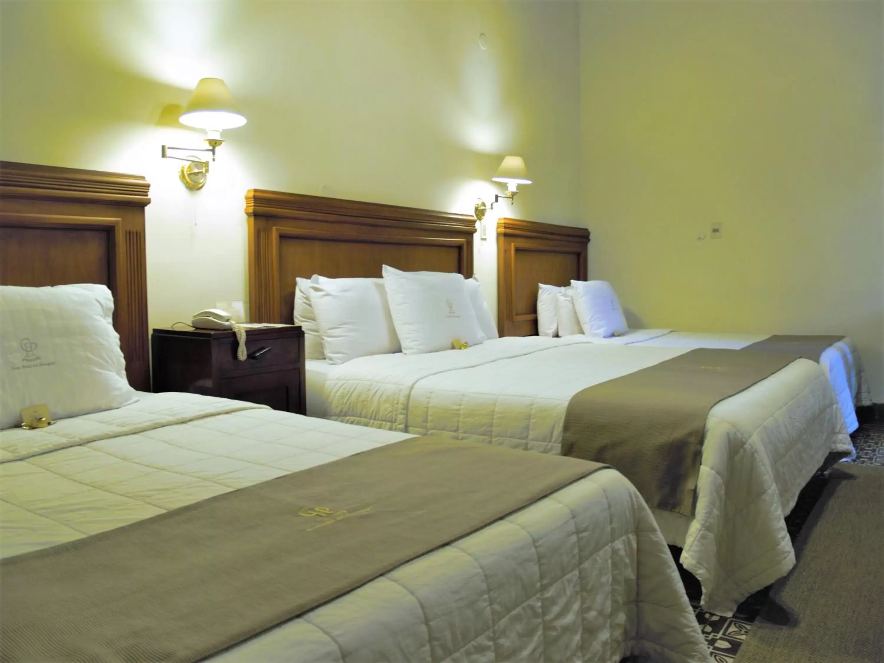 Quadruple Room with Garden View - single occupancy in Gran Hotel del Paraguay Quadruple Room with Garden View - single occupancy in Gran Hotel del Paraguay