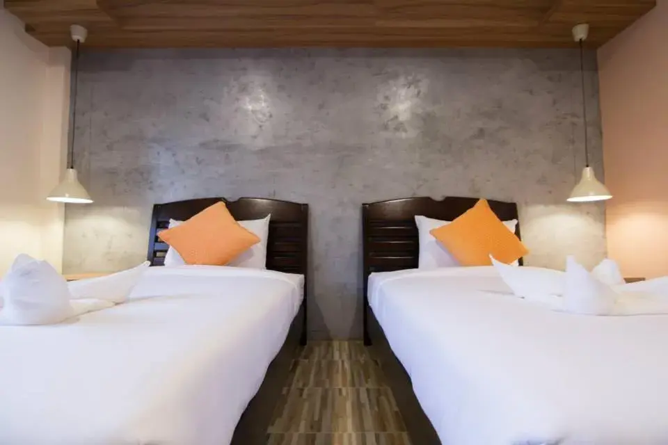 Bed in K.L. Boutique Hotel