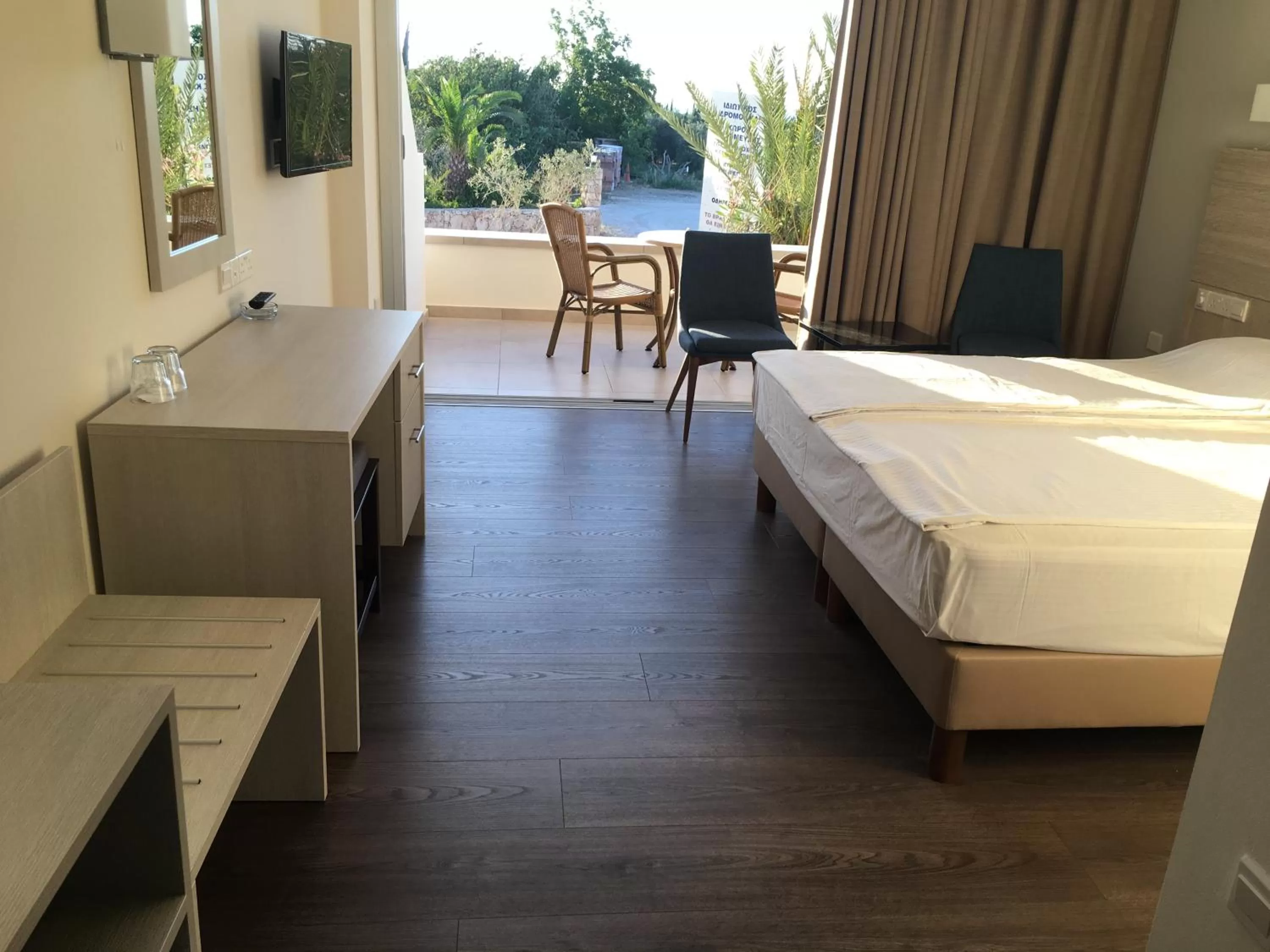 Bed in Aphrodite Beach Hotel