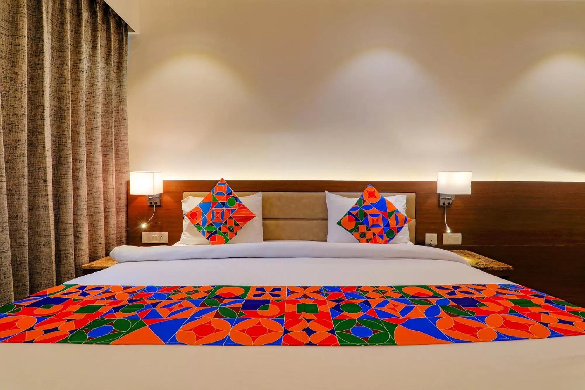 Bed in FabHotel Aurelia Grand