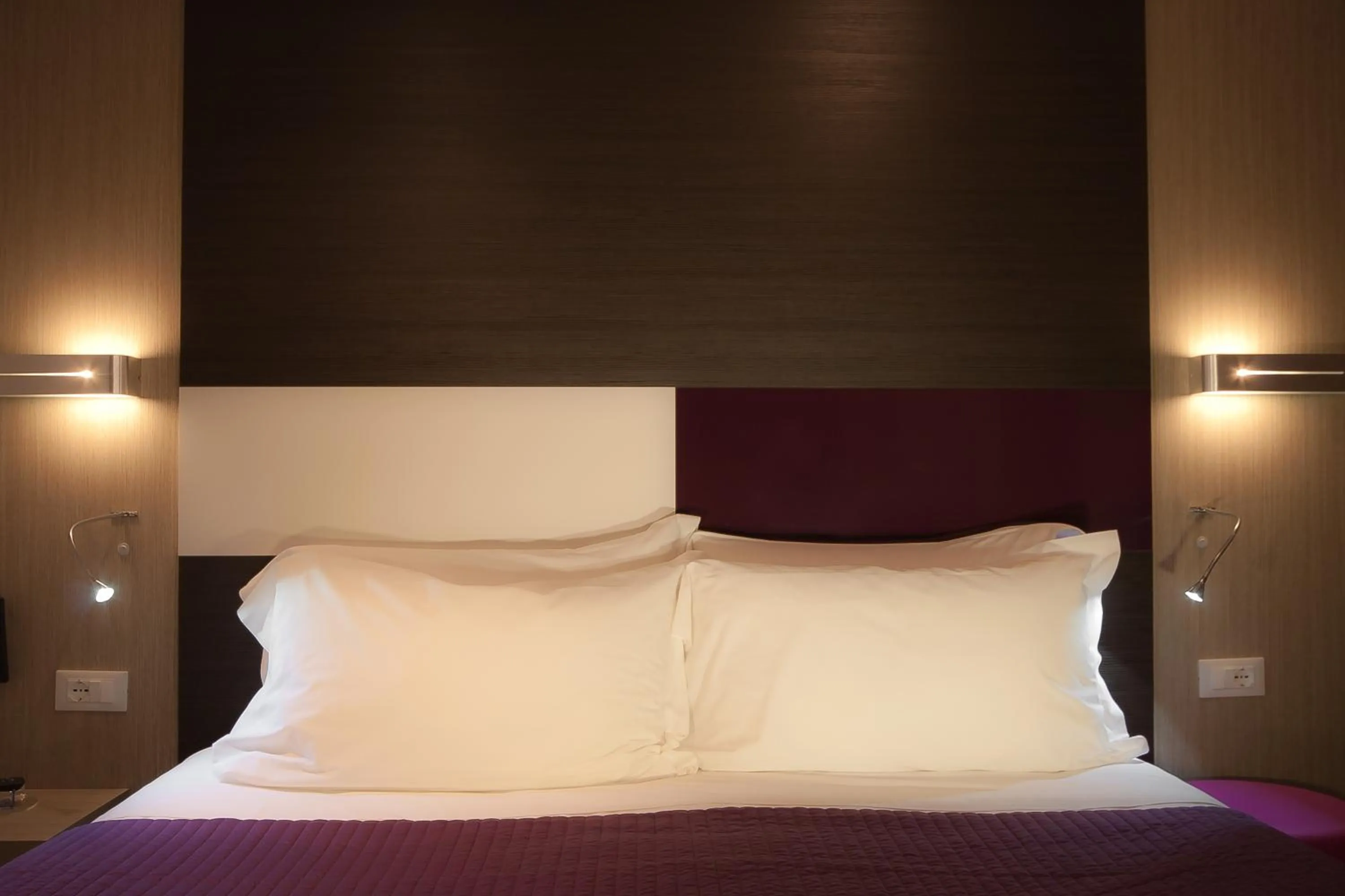 Bed in Genius Hotel Downtown