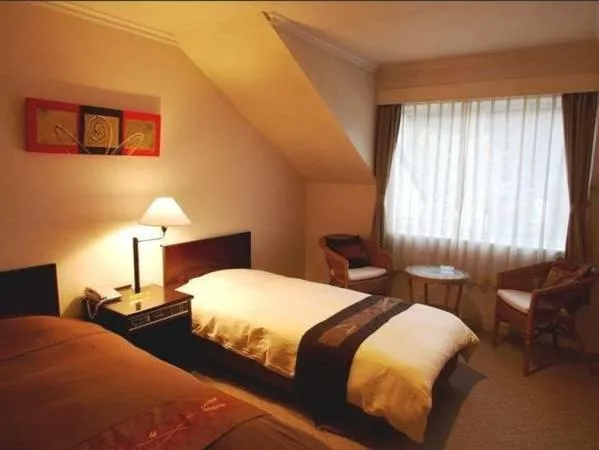 Bed in Hotel Natural Garden Nikko